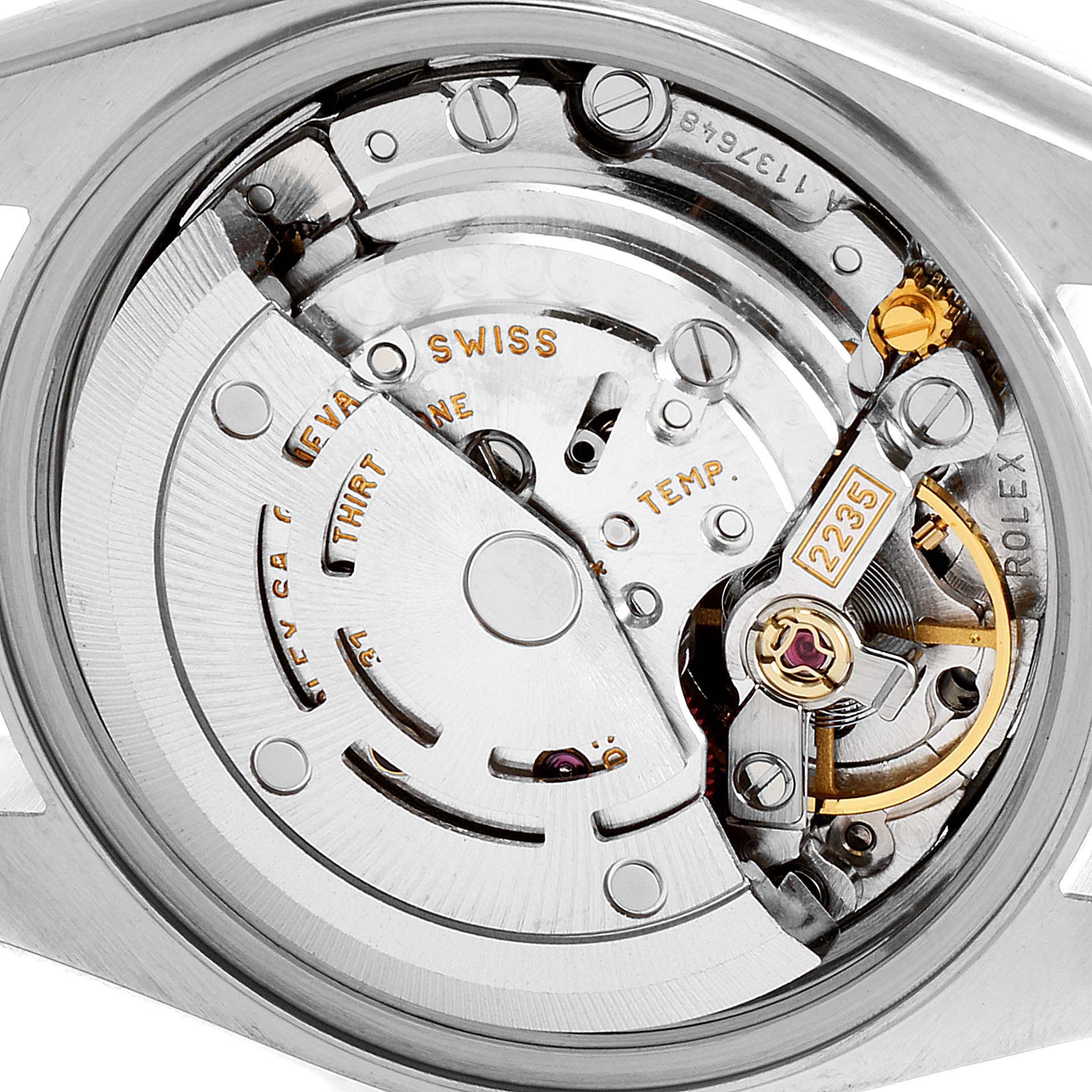 The image shows the internal mechanism of a Rolex Datejust 79173 Women's Steel and Gold (two tone) Beige Dial 79173 Women's Steel and Gold (two tone) Beige Dial watch viewed from the back.