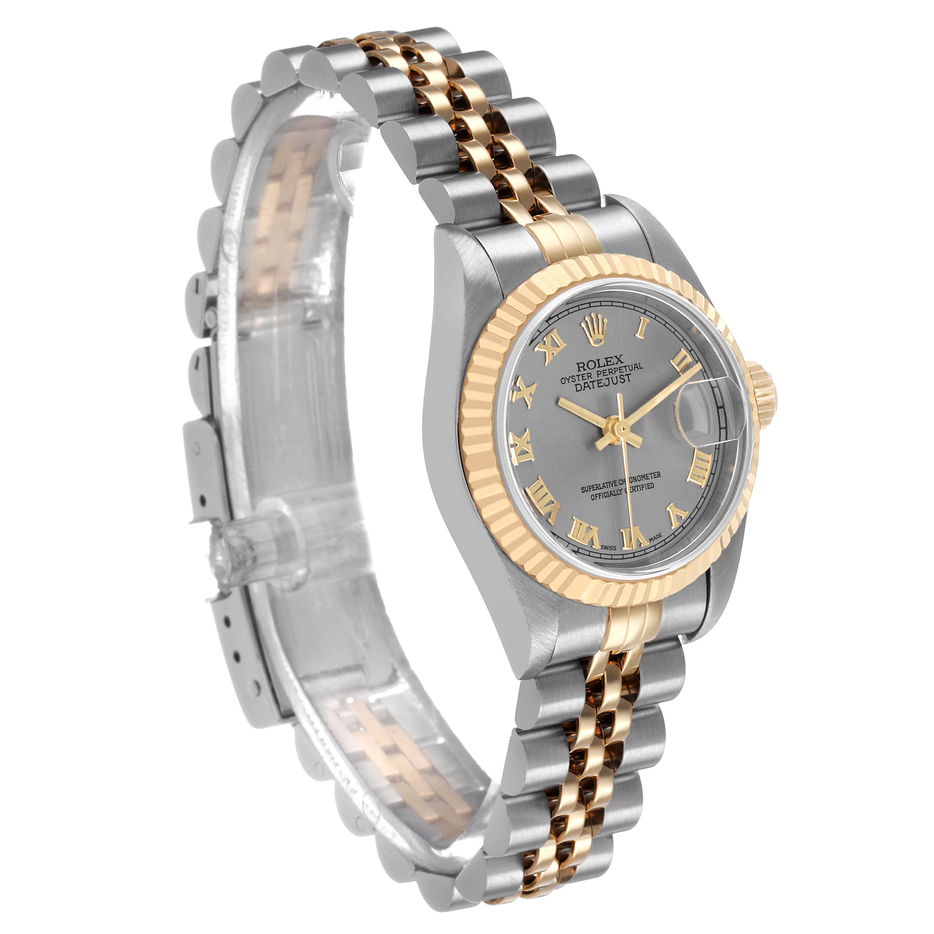 The Rolex Datejust 79173 Women's Steel and Gold (two tone) Silver Dial watch is shown from a three-quarter angle, displaying its bracelet, bezel, and face.