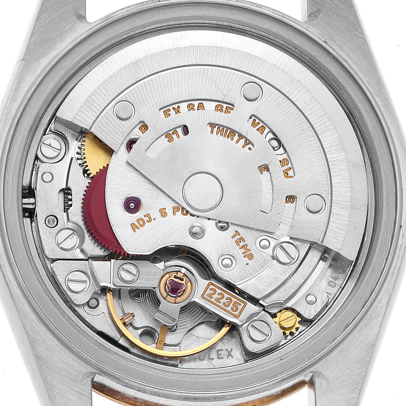 The image shows the back view of a Rolex Datejust 79173 Women's Steel and Gold (two tone) Silver Dial watch, focusing on its intricate internal movement parts.