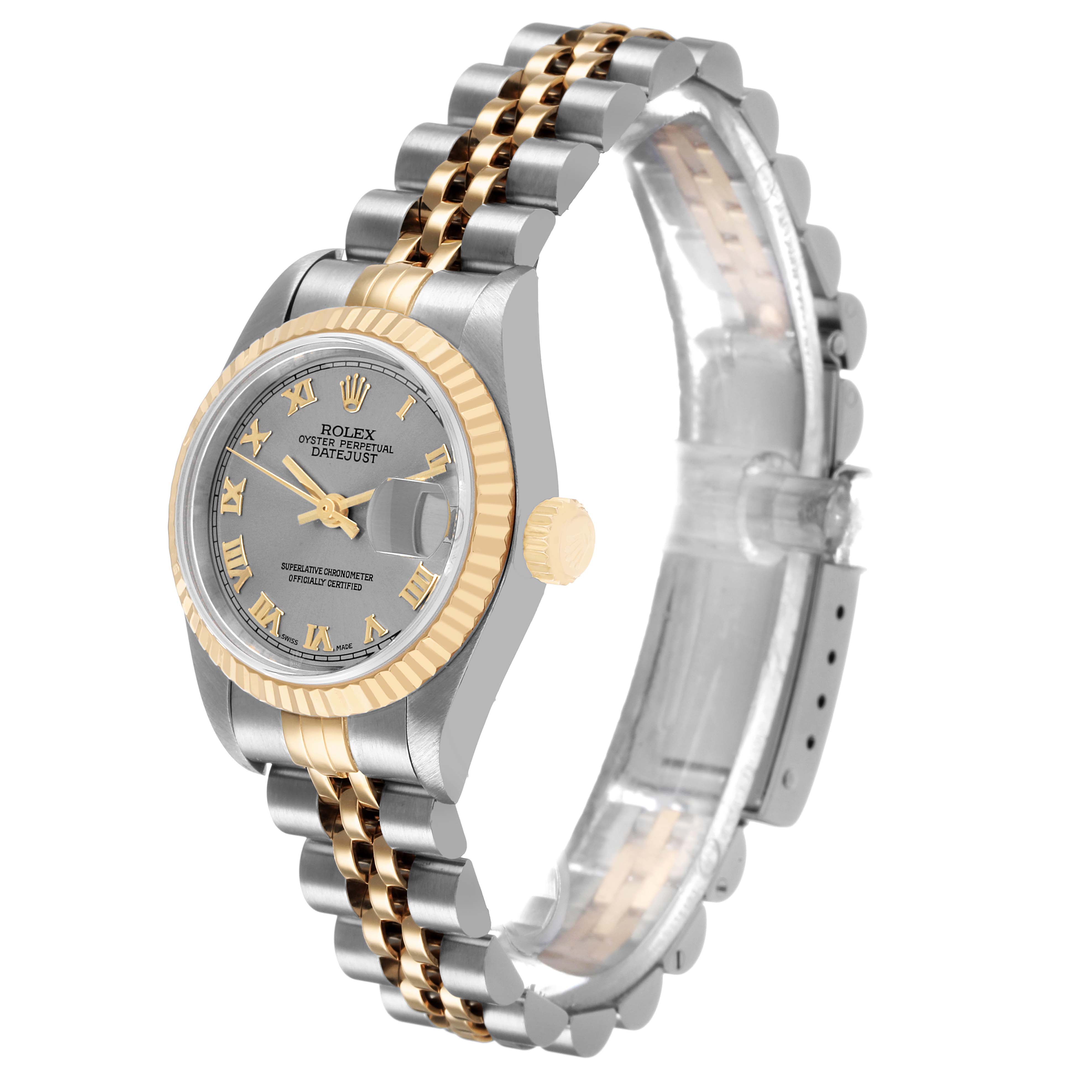 The Rolex Datejust 79173 Women's Steel and Gold (two tone) Silver Dial watch is shown at a three-quarter angle, highlighting the dial, fluted bezel, and two-tone Jubilee bracelet.