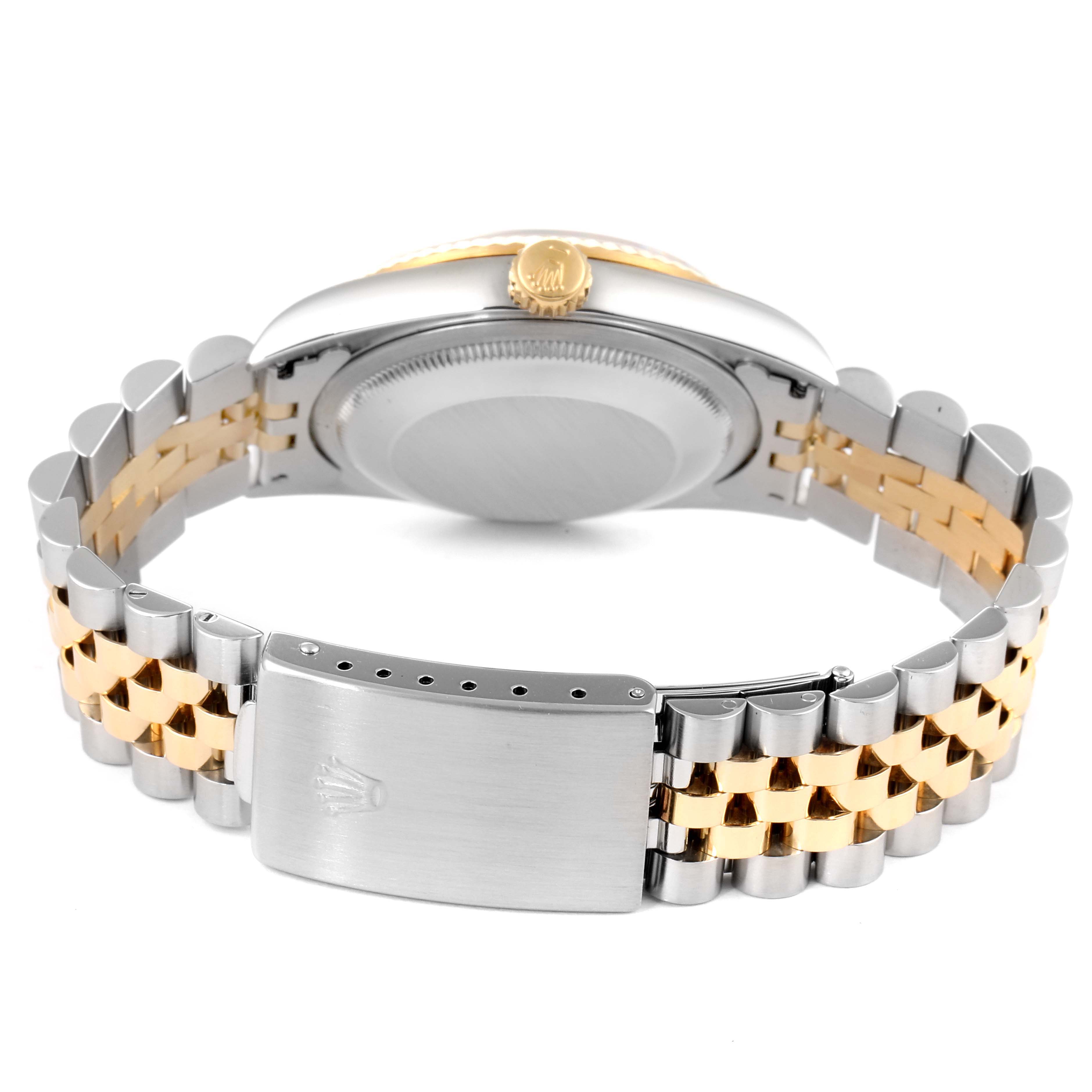 The image shows the backside of the Rolex Datejust 16233 Men's Steel and Gold (two tone) Blue Dial 16233 Men's Steel and Gold (two tone) Blue Dial model, highlighting the clasp, bracelet, and case back.