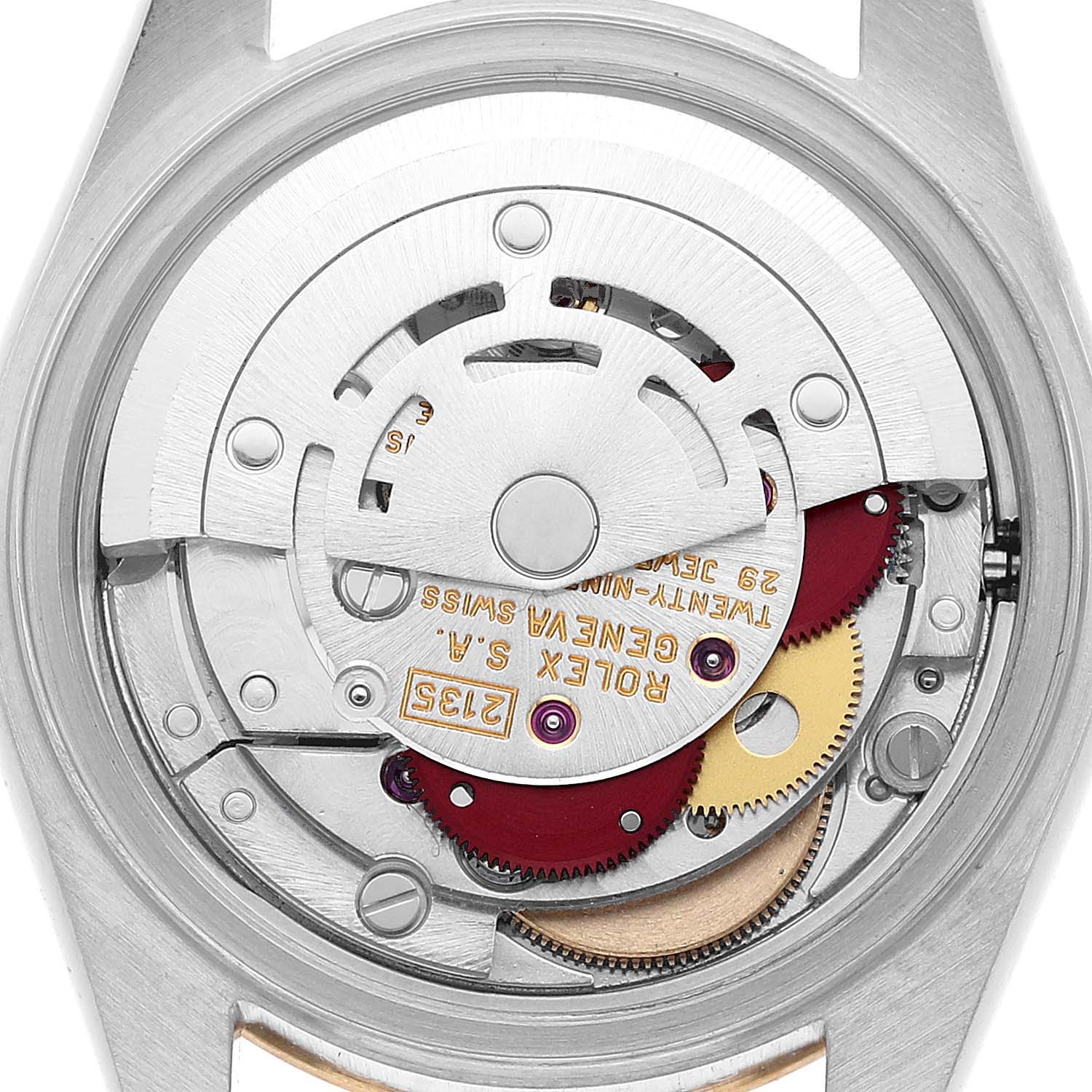 The image shows the open case back of a Rolex Datejust 69163 Women's Steel and Gold (two tone) White Dial, revealing the intricate movement and gears inside.