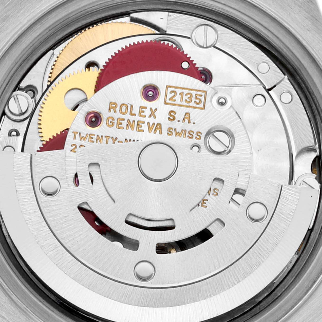 This image shows the internal movement mechanism of the Rolex Datejust 69173 Women's Steel and Gold (two tone) White Dial 69173 Women's Steel and Gold (two tone) White Dial watch, focusing on the gears and inscriptions.