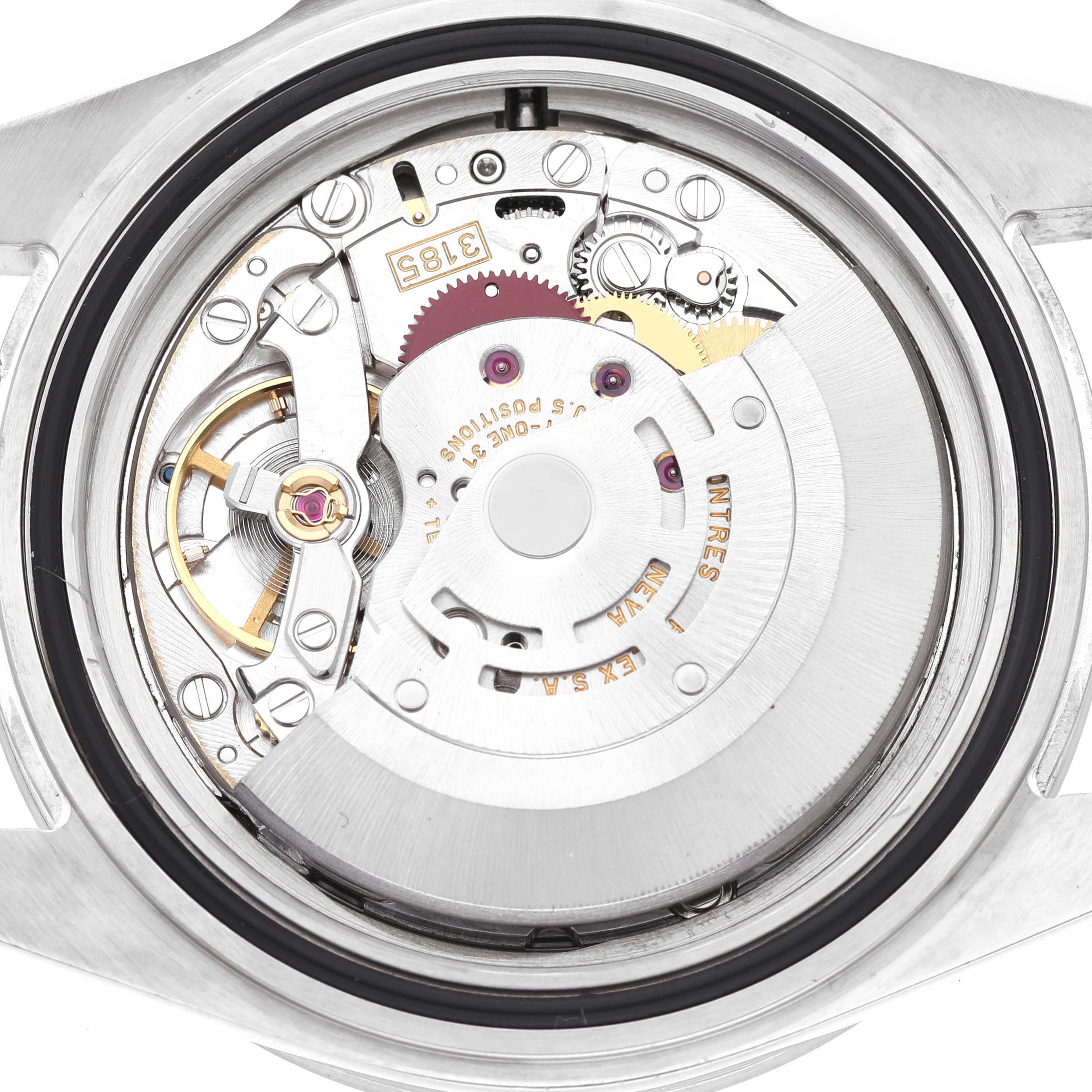 The image shows the internal movement of a Rolex Explorer 16570 Men's Stainless Steel White Dial watch from a top-down angle, revealing its intricate mechanical components.