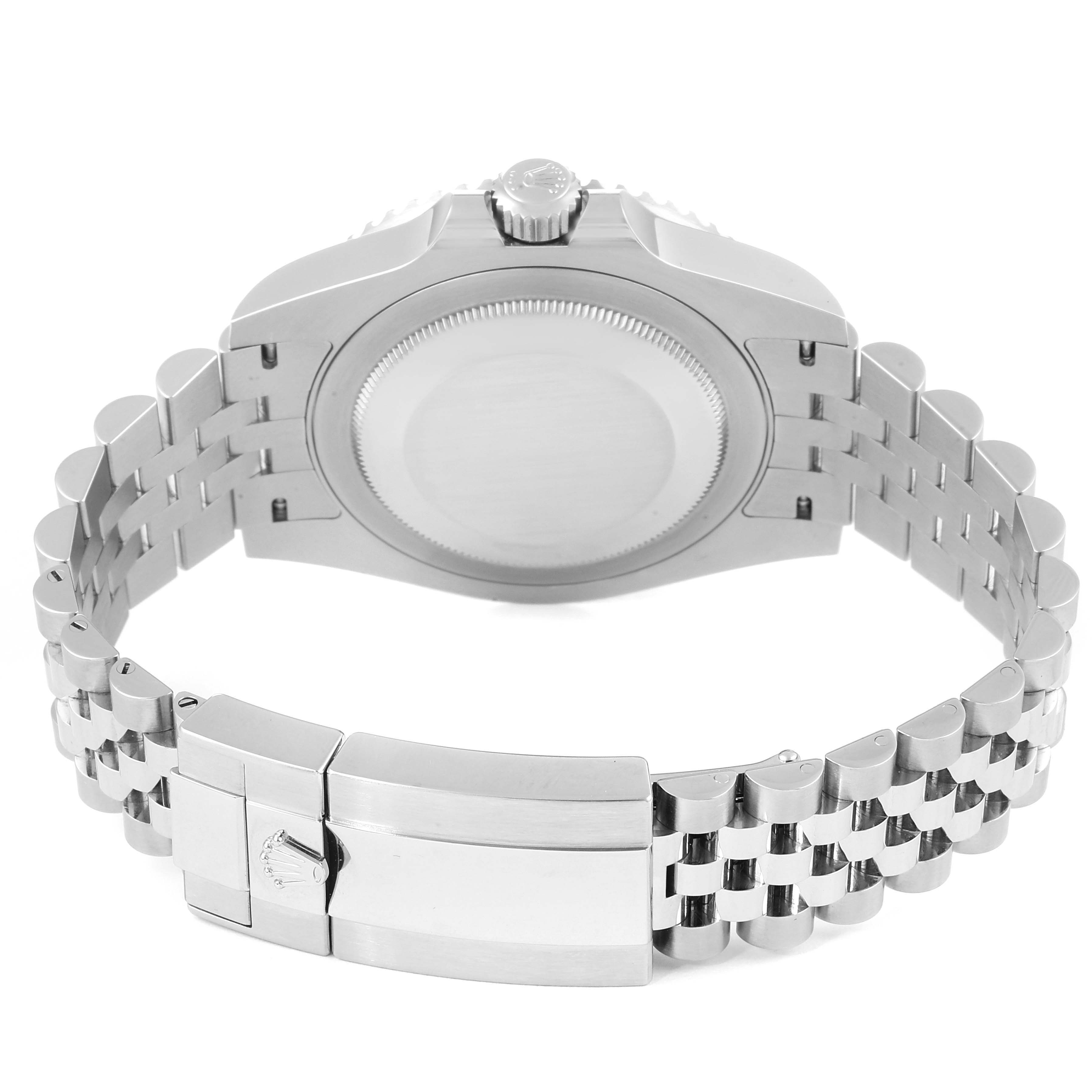 This image shows the back case and bracelet clasp of a Rolex GMT-Master 126710 Men's Stainless Steel Black Dial 126710 Men's Stainless Steel Black Dial watch from a slightly elevated rear angle.