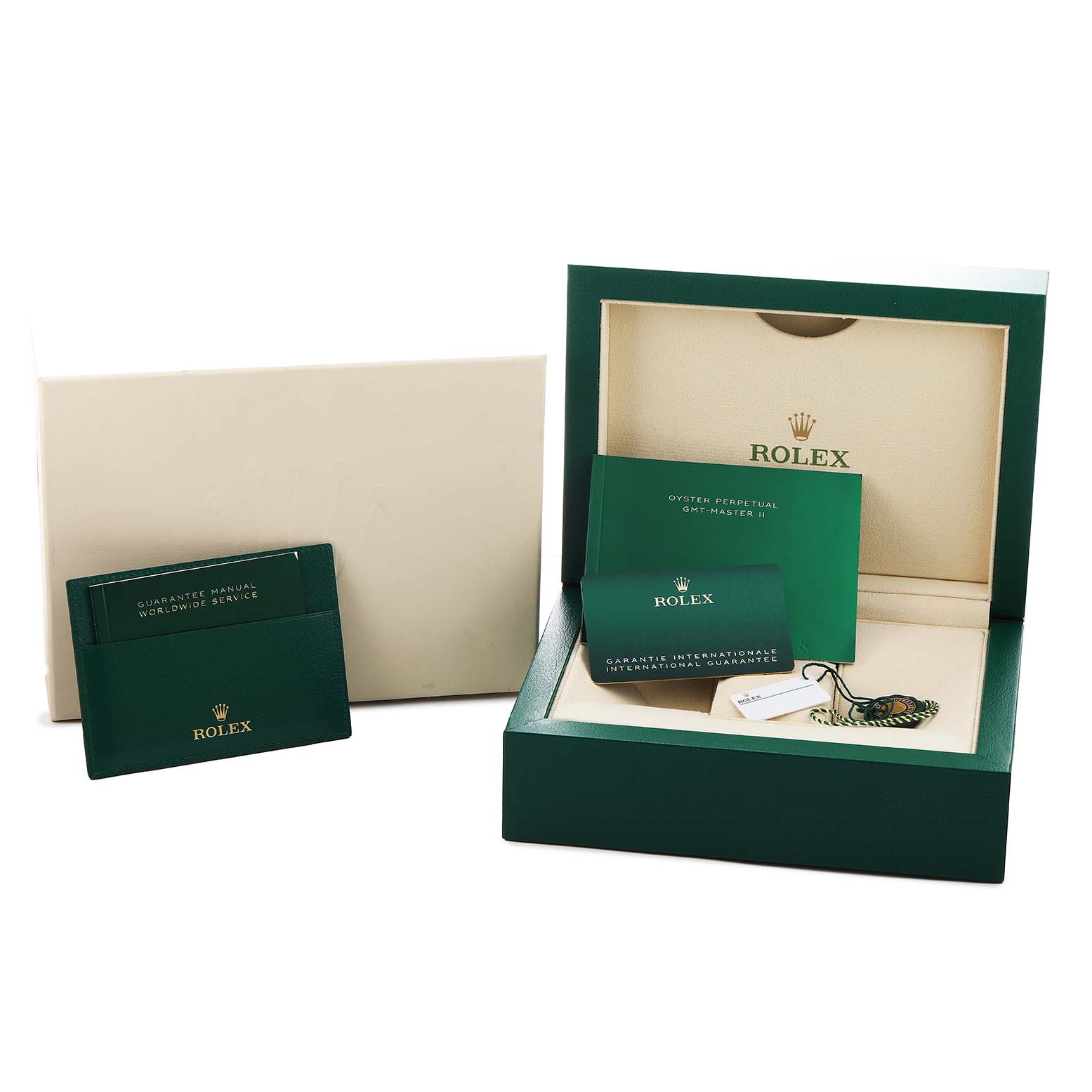 The image shows a Rolex GMT-Master 126710GRNR Men's Stainless Steel Black Dial box with manuals, an international guarantee card, and a protective packaging.