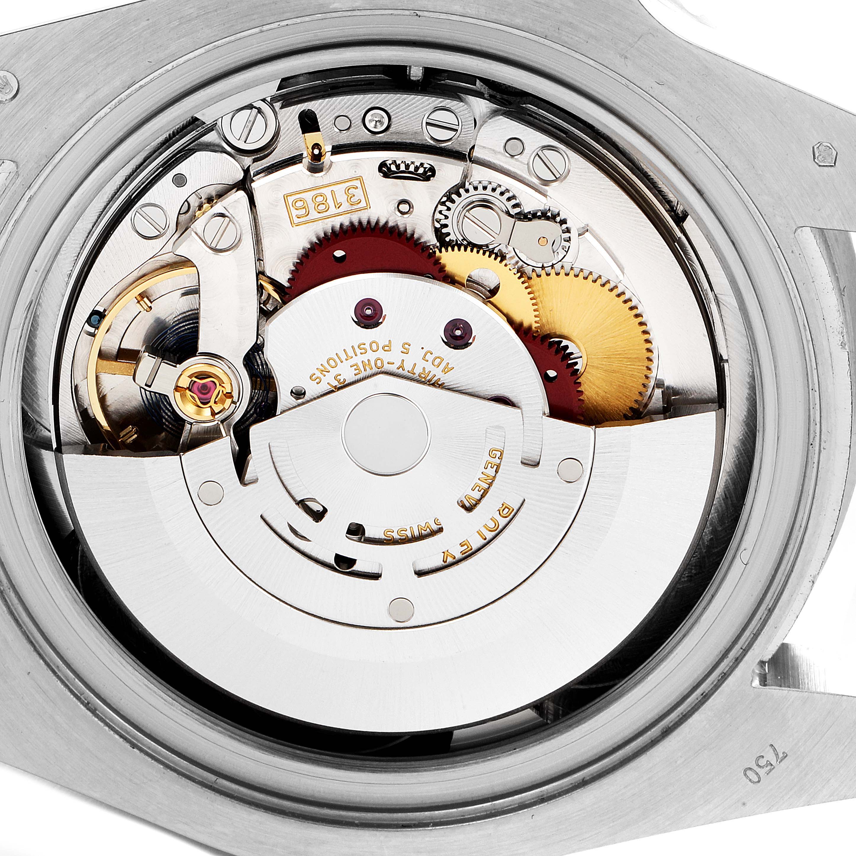 This is an internal view of the Rolex GMT-Master 116719 Men's White Gold Black Dial 116719 Men's White Gold Black Dial watch, showing its intricate movement and mechanical parts from the back.