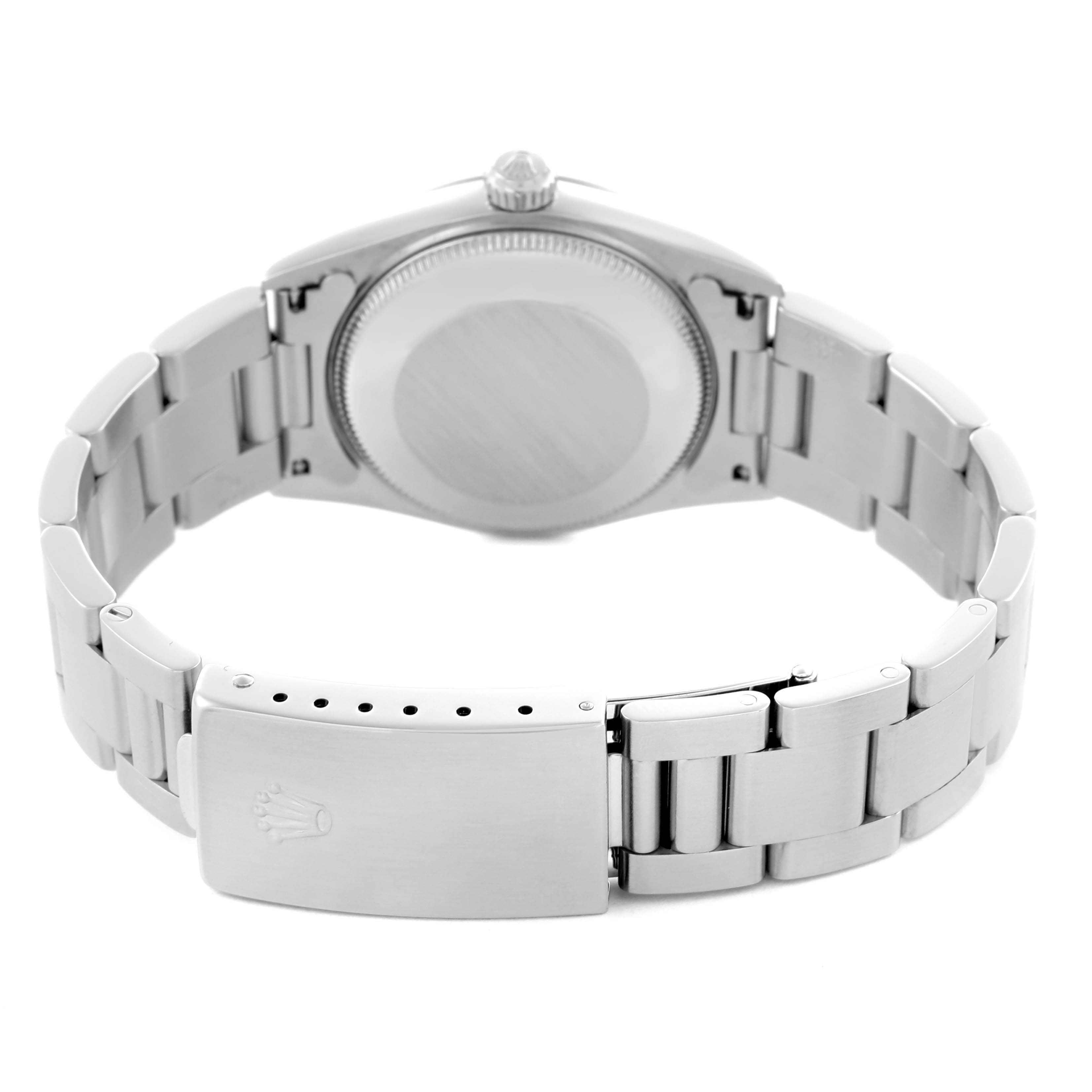 The Rolex Mid-Size 77080 Women's Stainless Steel Black Dial 77080 Women's Stainless Steel Black Dial watch is shown from the back, highlighting the case back, bracelet links, and clasp.