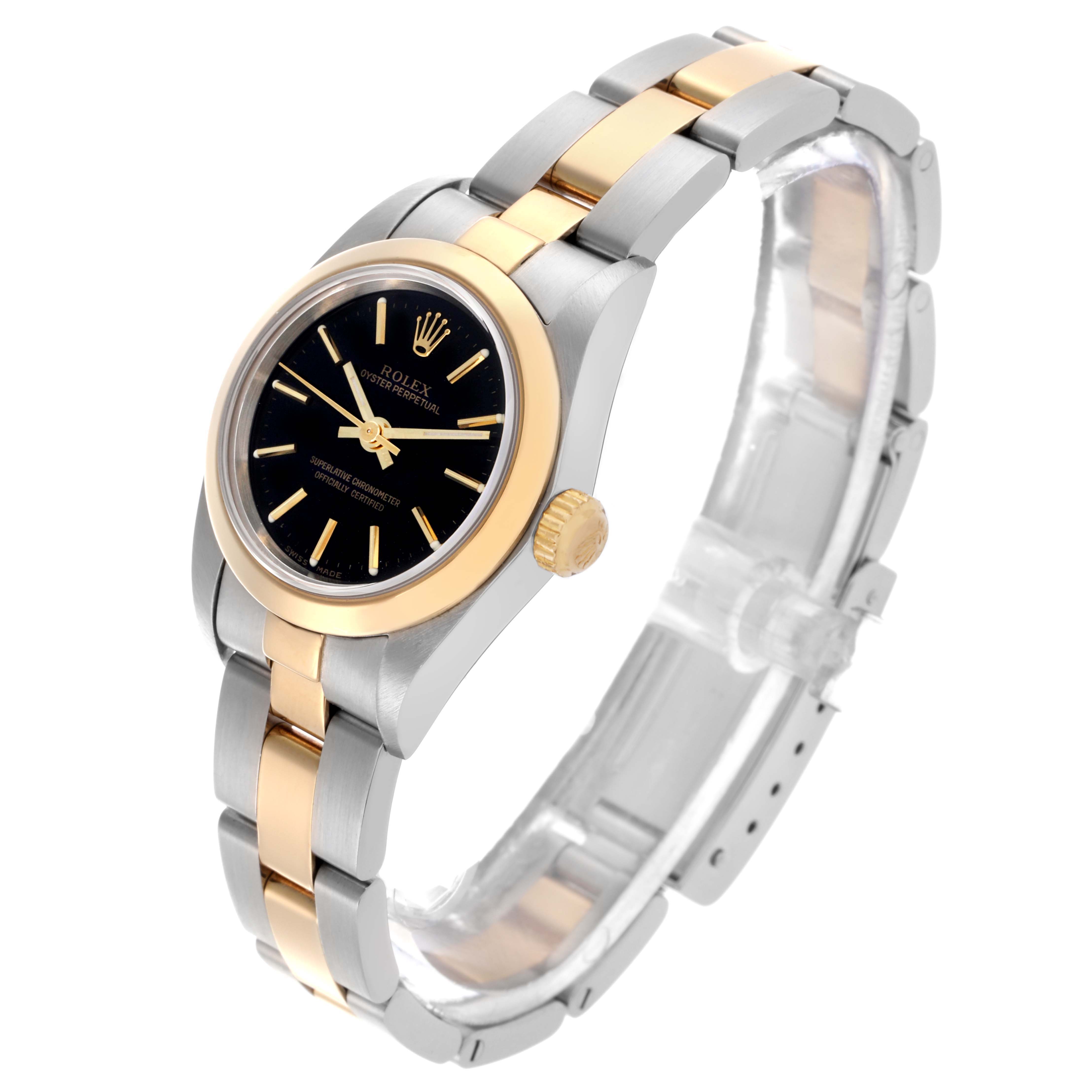 The Rolex Datejust 76183 Women's Steel and Gold (two tone) Black Dial 76183 Women's Steel and Gold (two tone) Black Dial watch is shown at a slight angle, highlighting the gold and silver bracelet, crown, and black dial.