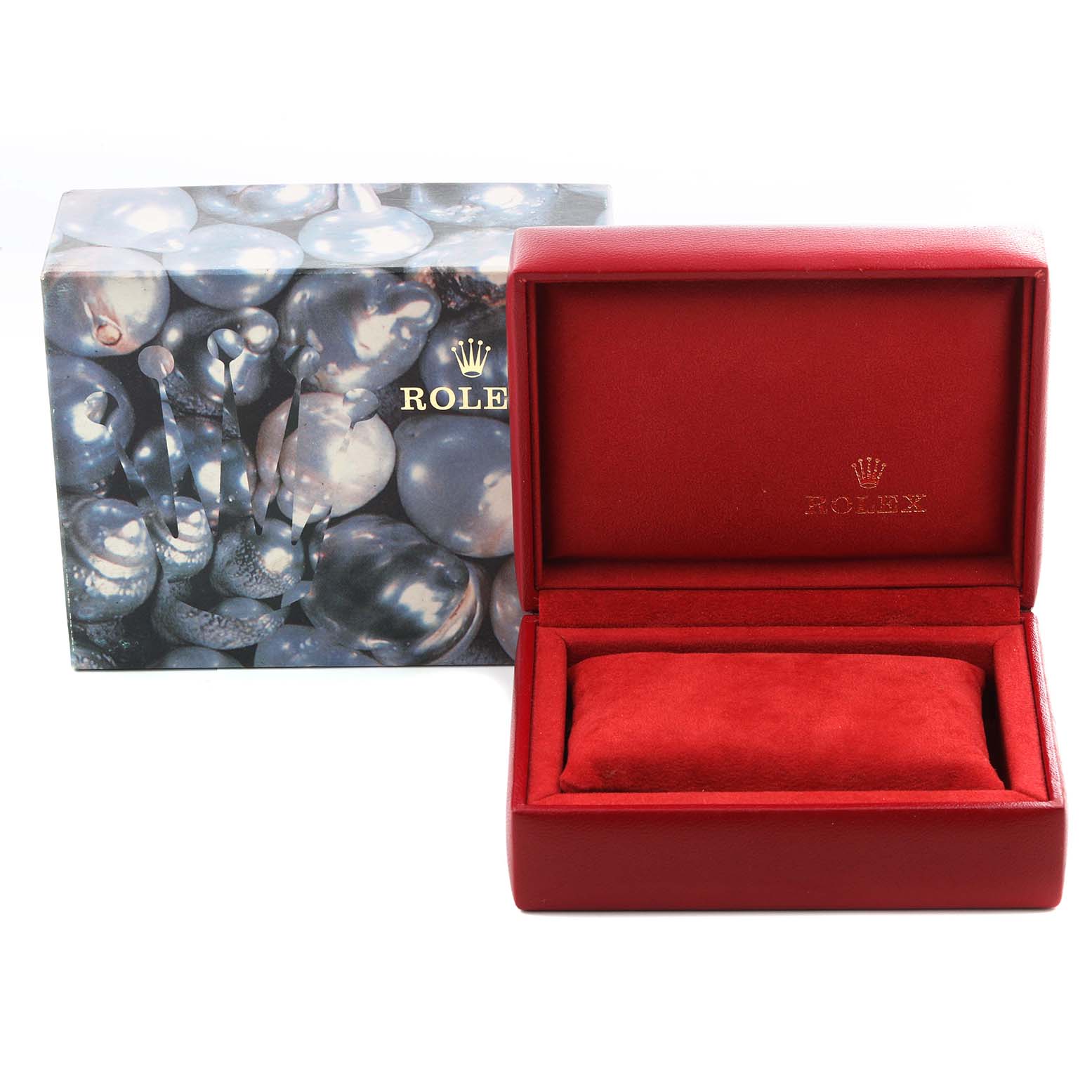 The image shows a Rolex Datejust 76183 Women's Steel and Gold (two tone) Black Dial 76183 Women's Steel and Gold (two tone) Black Dial watch box and outer packaging, featuring a red interior and decorative outer design.