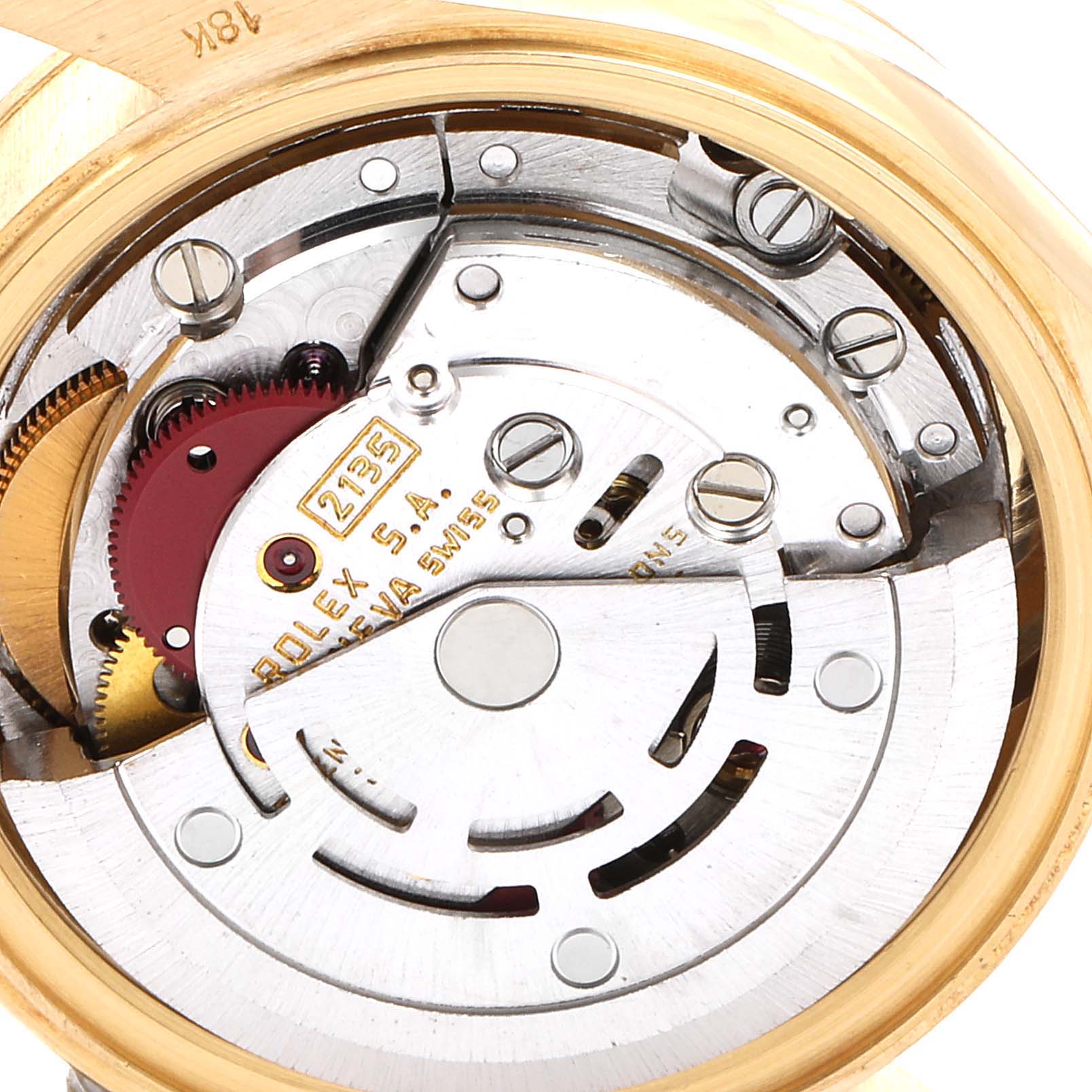 The image shows the internal mechanism of a Rolex President 69178 Women
s Yellow Gold Champagne Dial 69178 Women
s Yellow Gold Champagne Dial model watch at an angled close-up view.