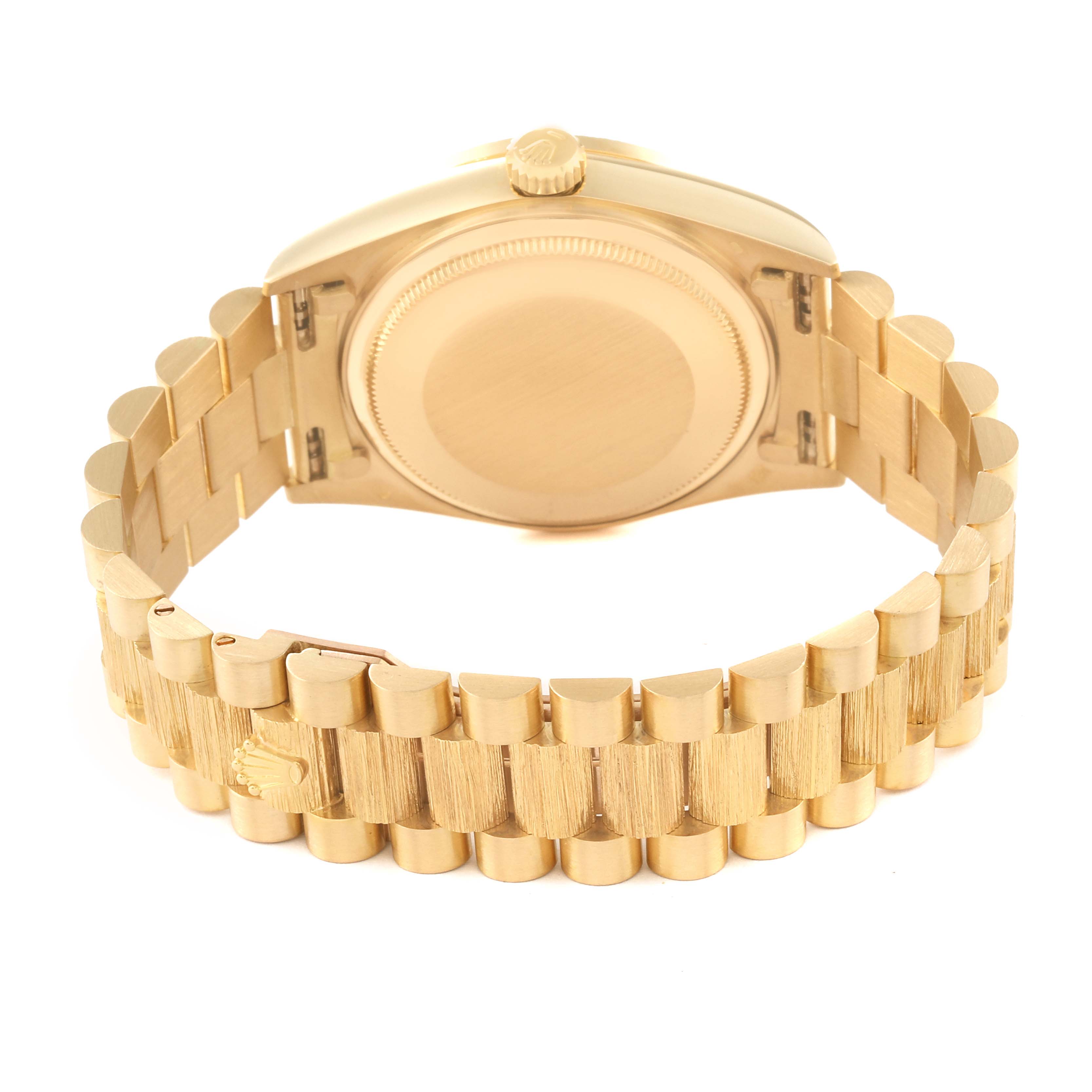 The image shows the back view of a Rolex President 18108 Men's Yellow Gold Black Dial 18108 Men's Yellow Gold Black Dial model watch, highlighting its gold case, crown, and bracelet.