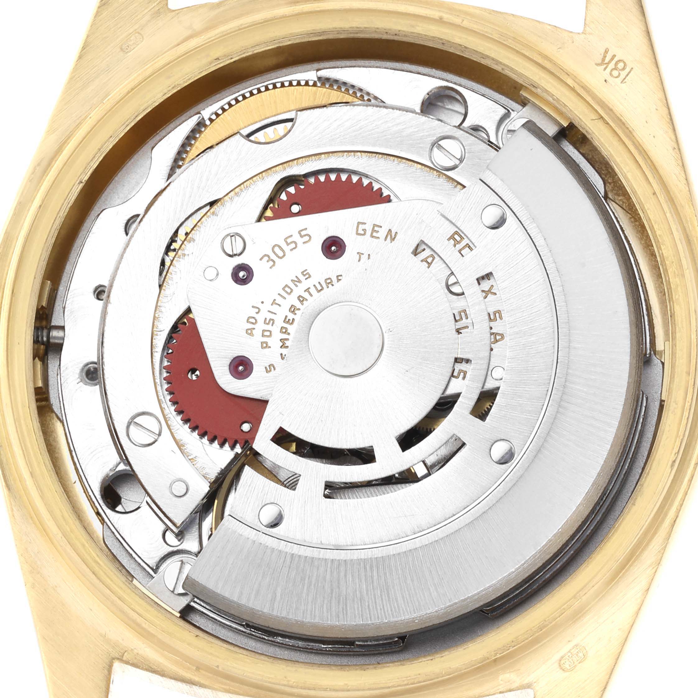 The image shows the inner mechanism of a Rolex President 18038 Men's Yellow Gold Silver Dial 18038 Men's Yellow Gold Silver Dial model watch, focusing on the movement and gears from a rear angle.