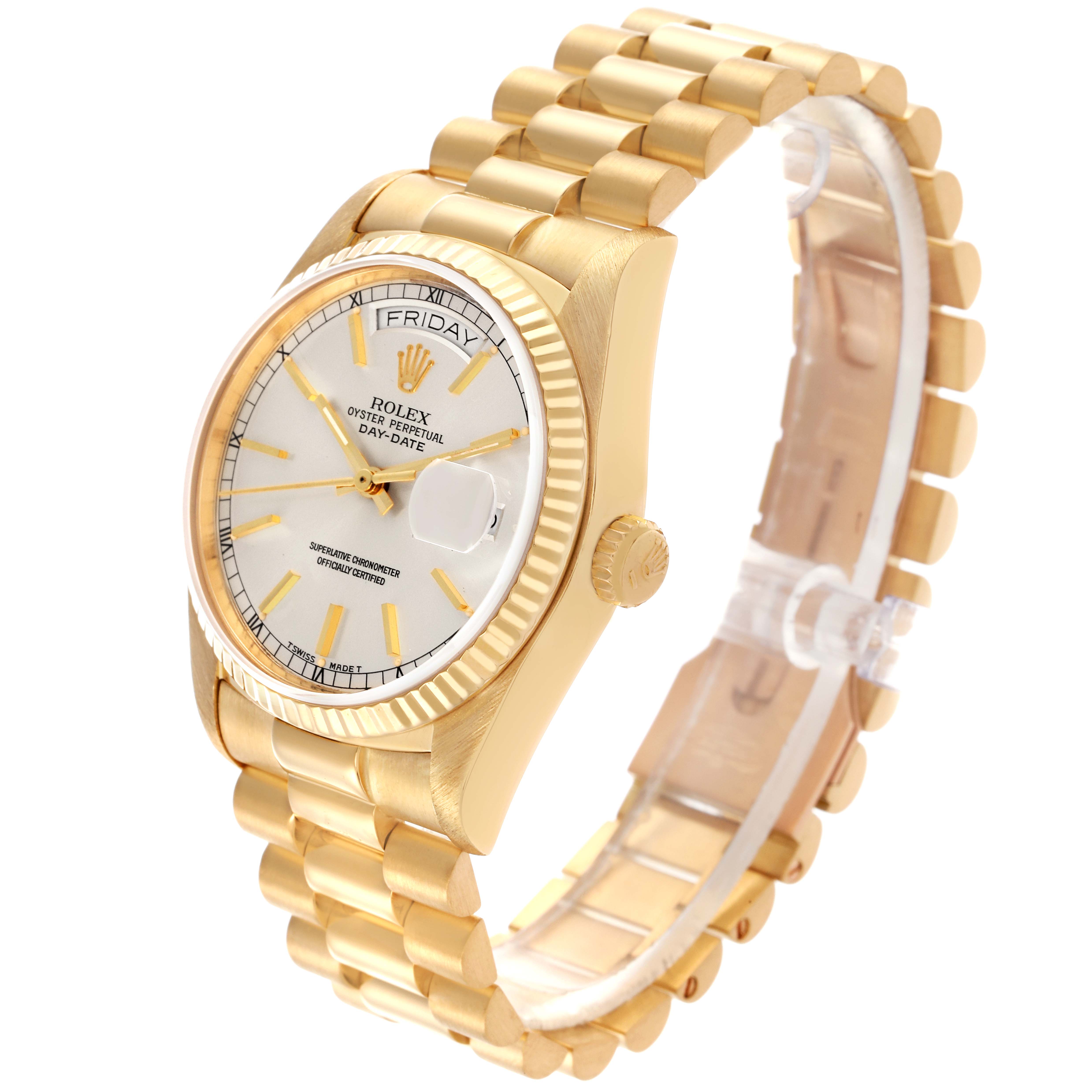 The Rolex President 18038 Men's Yellow Gold Silver Dial 18038 Men's Yellow Gold Silver Dial model watch is shown at an angled view, highlighting the dial, fluted bezel, case, and linked bracelet.