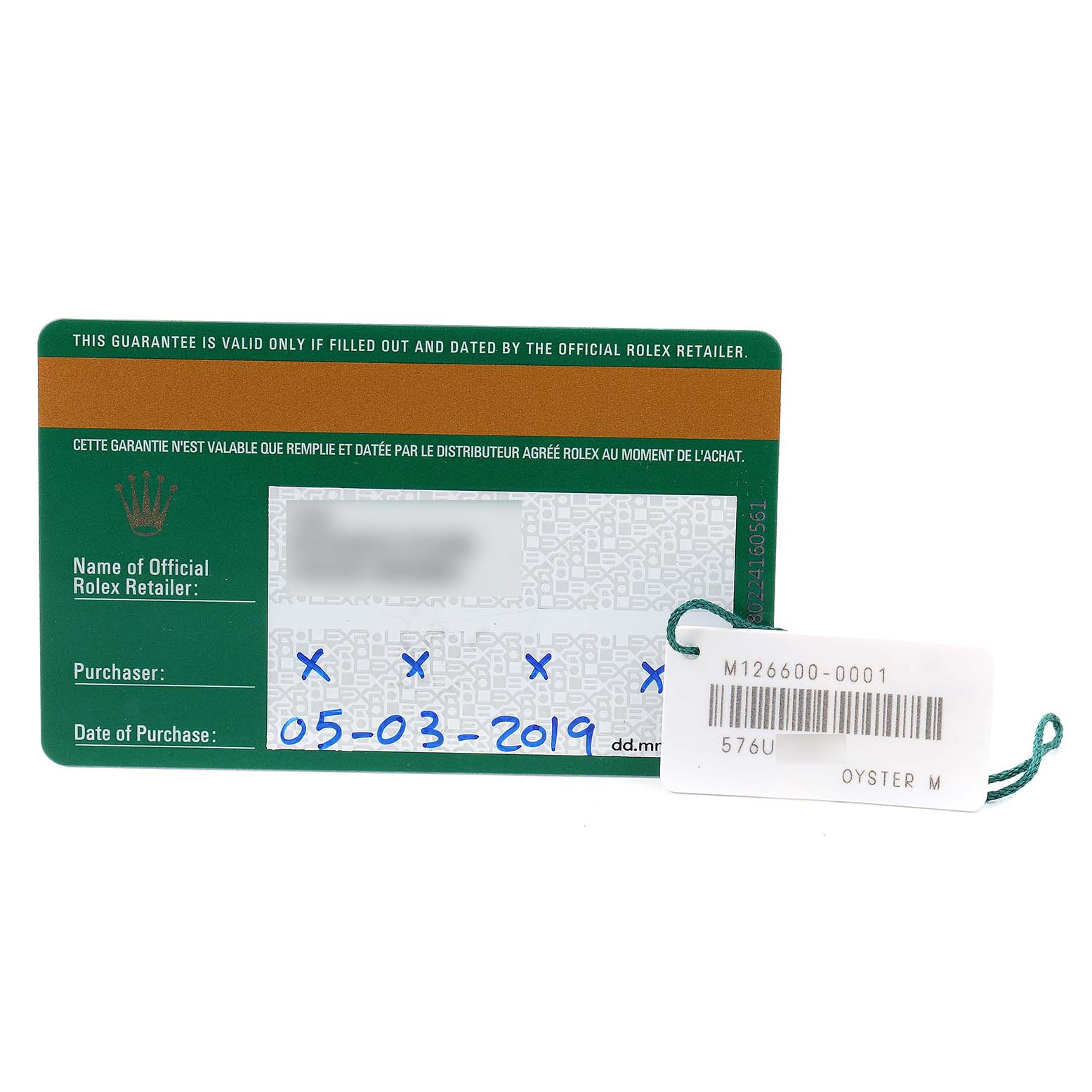 The image shows a warranty card and a tag for a Rolex Sea-Dweller 126600 Men
s Stainless Steel Black Dial 126600 Men
s Stainless Steel Black Dial watch.