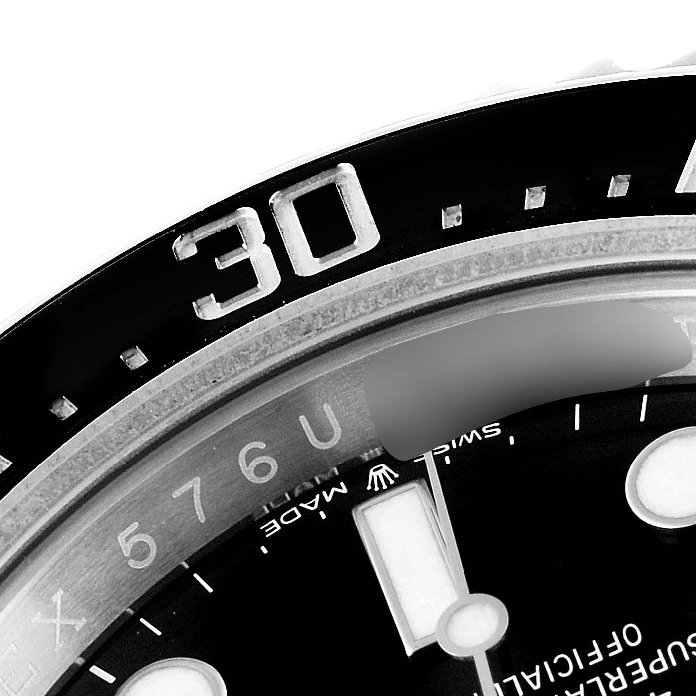The image shows a close-up of the dial and bezel, specifically the 30-minute marker, of the Rolex Sea-Dweller 126600 Men
s Stainless Steel Black Dial 126600 Men
s Stainless Steel Black Dial watch.
