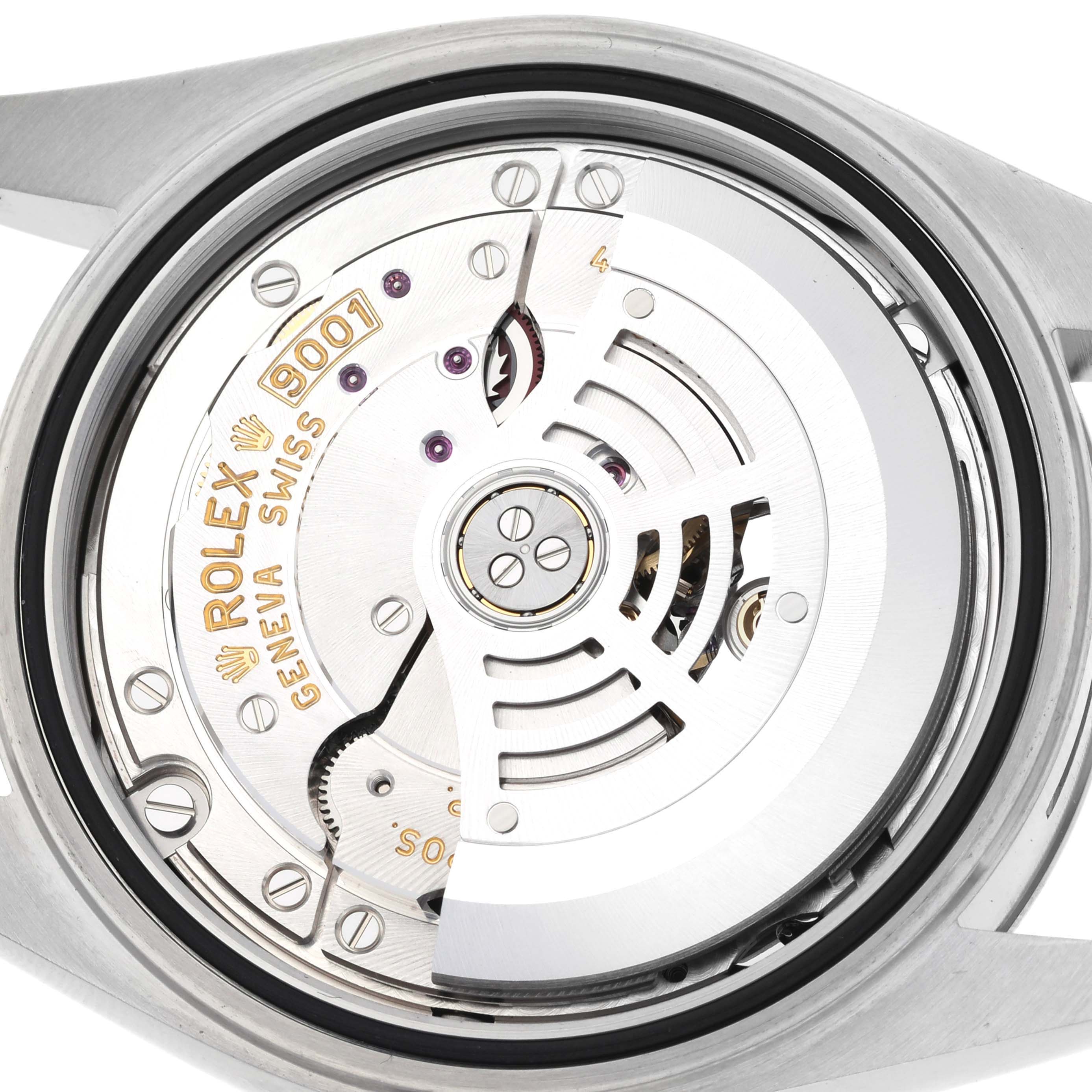 The image shows a close-up of the movement of a Rolex Sky-Dweller 326934 Men's Stainless Steel Blue Dial 326934 Men's Stainless Steel Blue Dial watch, focusing on the rotor and intricate gear details.