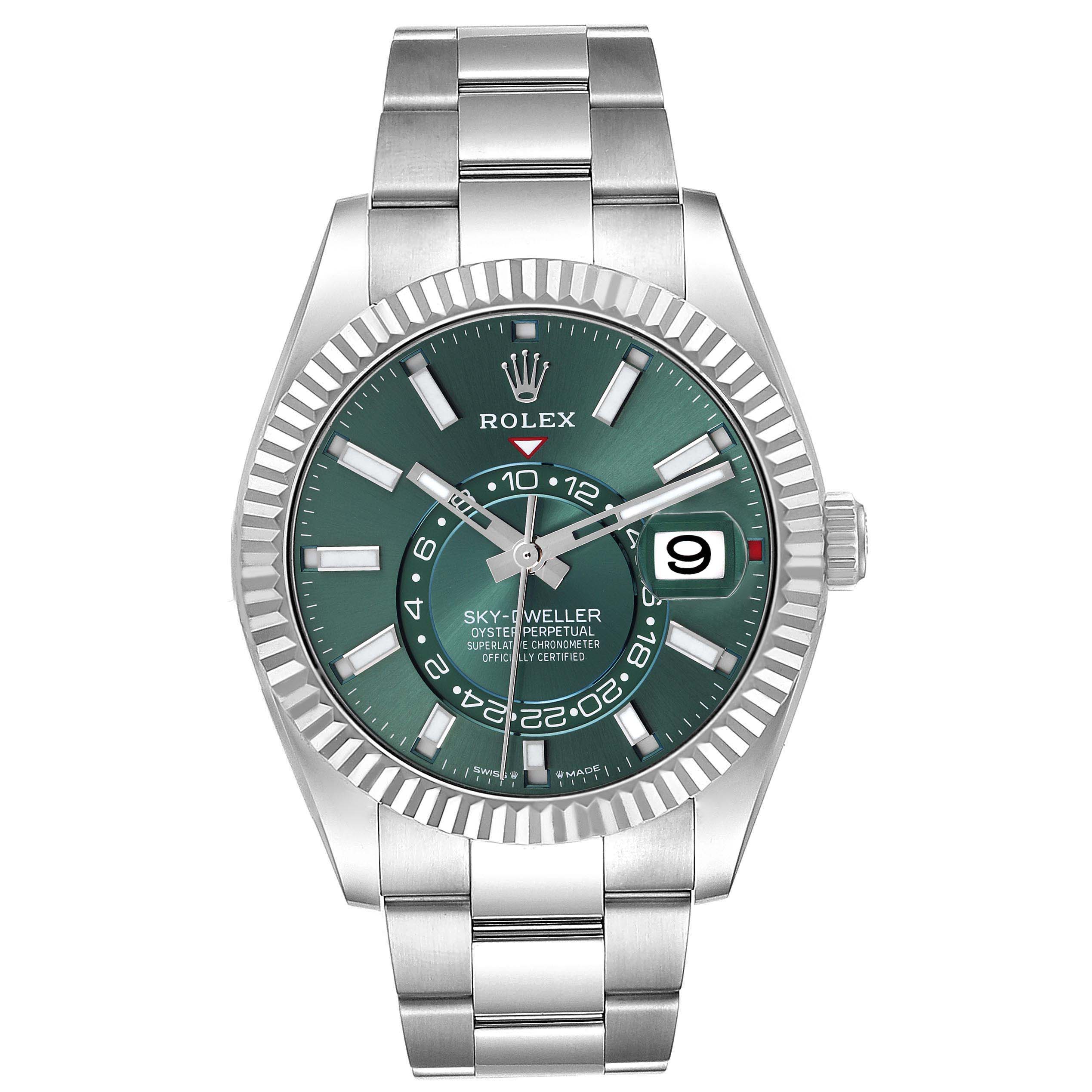 The Rolex Sky-Dweller 336934 Men's Stainless Steel Green Dial 336934 Men's Stainless Steel Green Dial is shown from a front angle, displaying its green dial, fluted bezel, and metal bracelet.