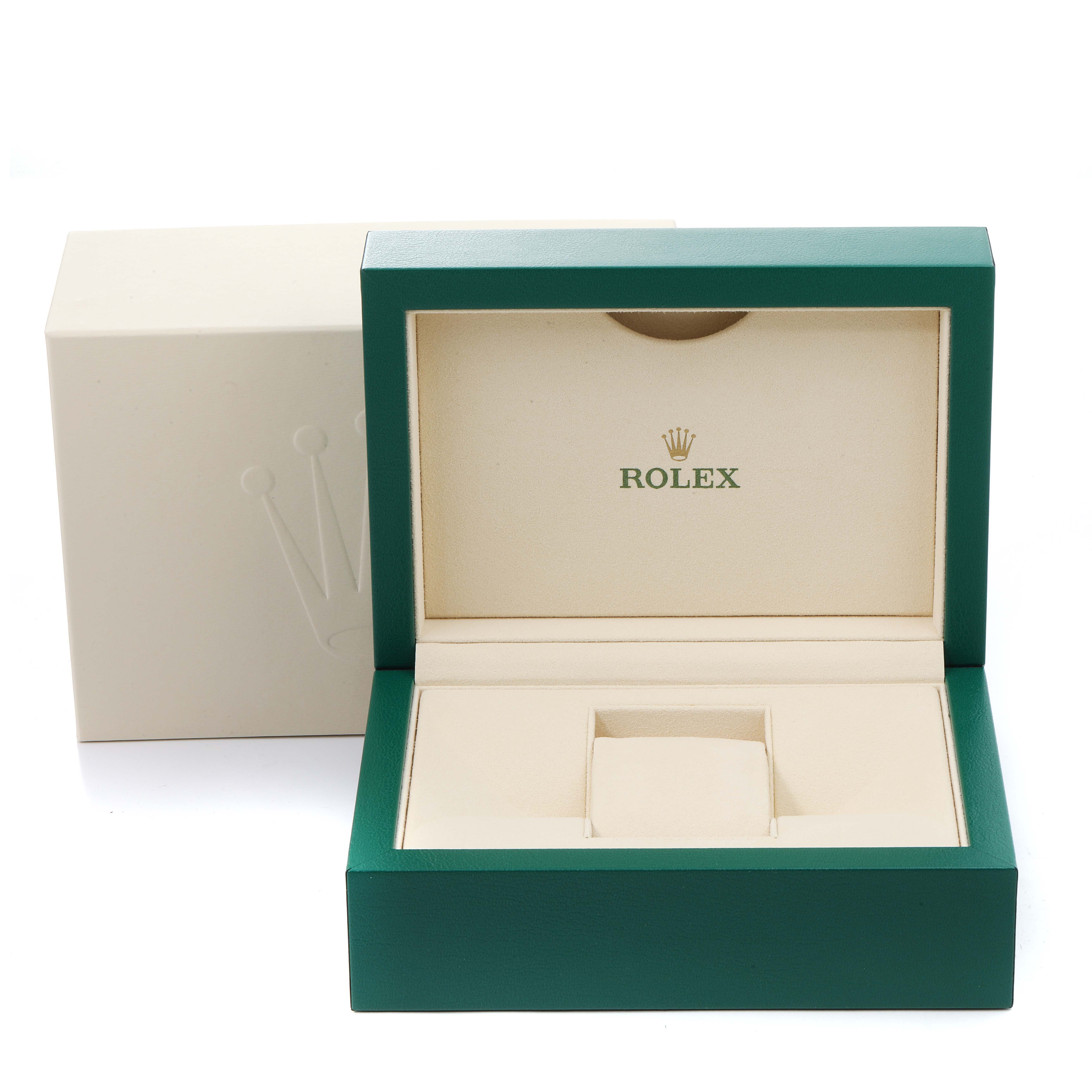 This image shows an open Rolex box for a Submariner model, displaying its interior compartment.