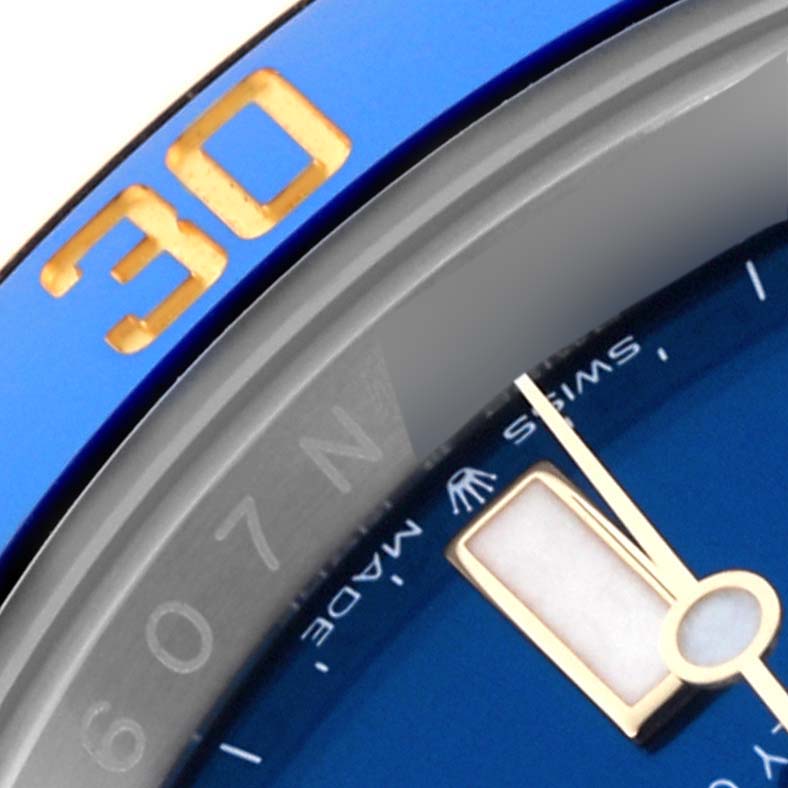 The image shows a close-up of the Rolex Submariner 126613LB Men's Steel and Gold (two tone) Blue Dial 126613LB Men's Steel and Gold (two tone) Blue Dial's blue bezel and partial dial, highlighting the gold "30" marker.