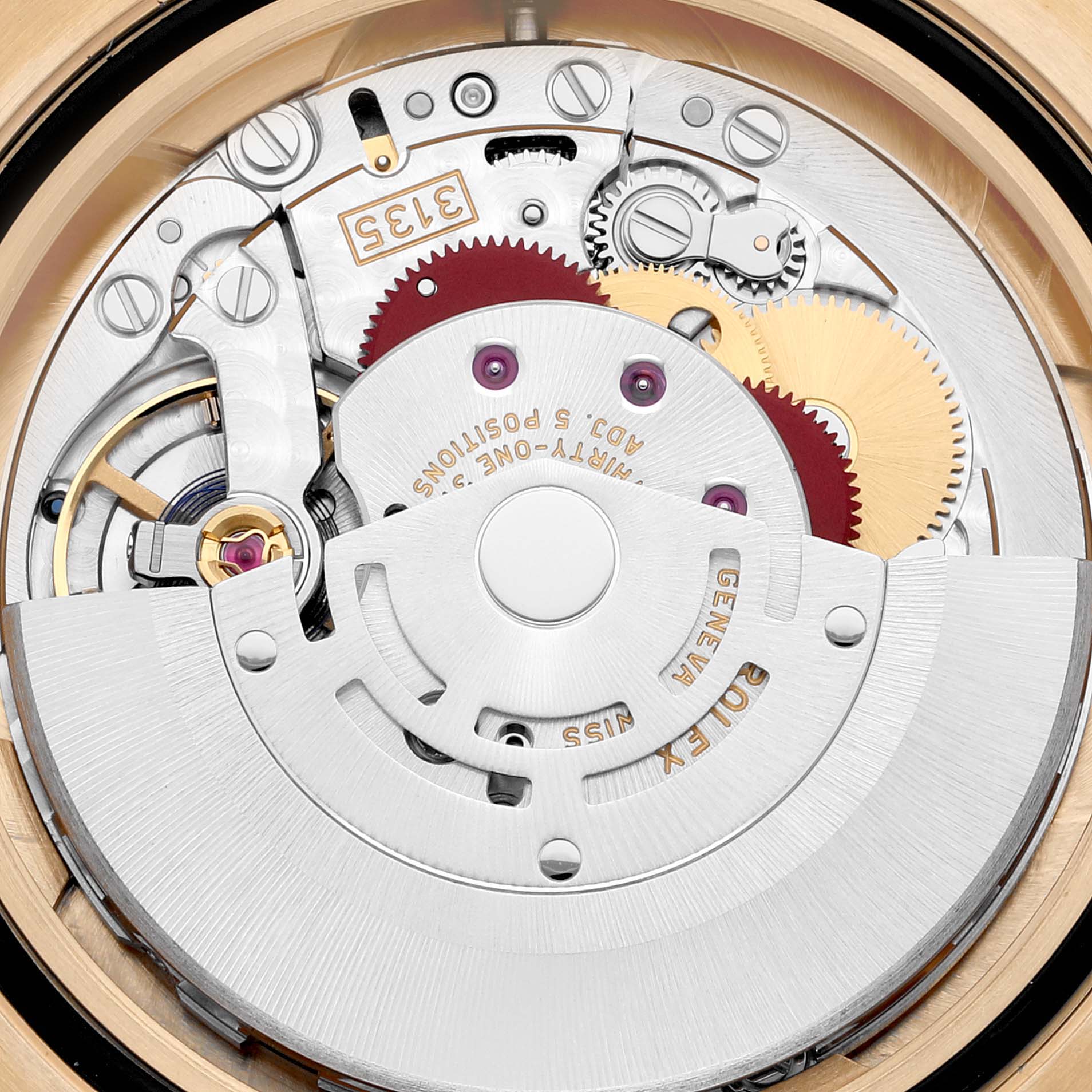 This image shows a close-up view of the internal mechanism of a Rolex Submariner 116618 Men's Yellow Gold Black Dial 116618 Men's Yellow Gold Black Dial watch, highlighting gears and movement components.
