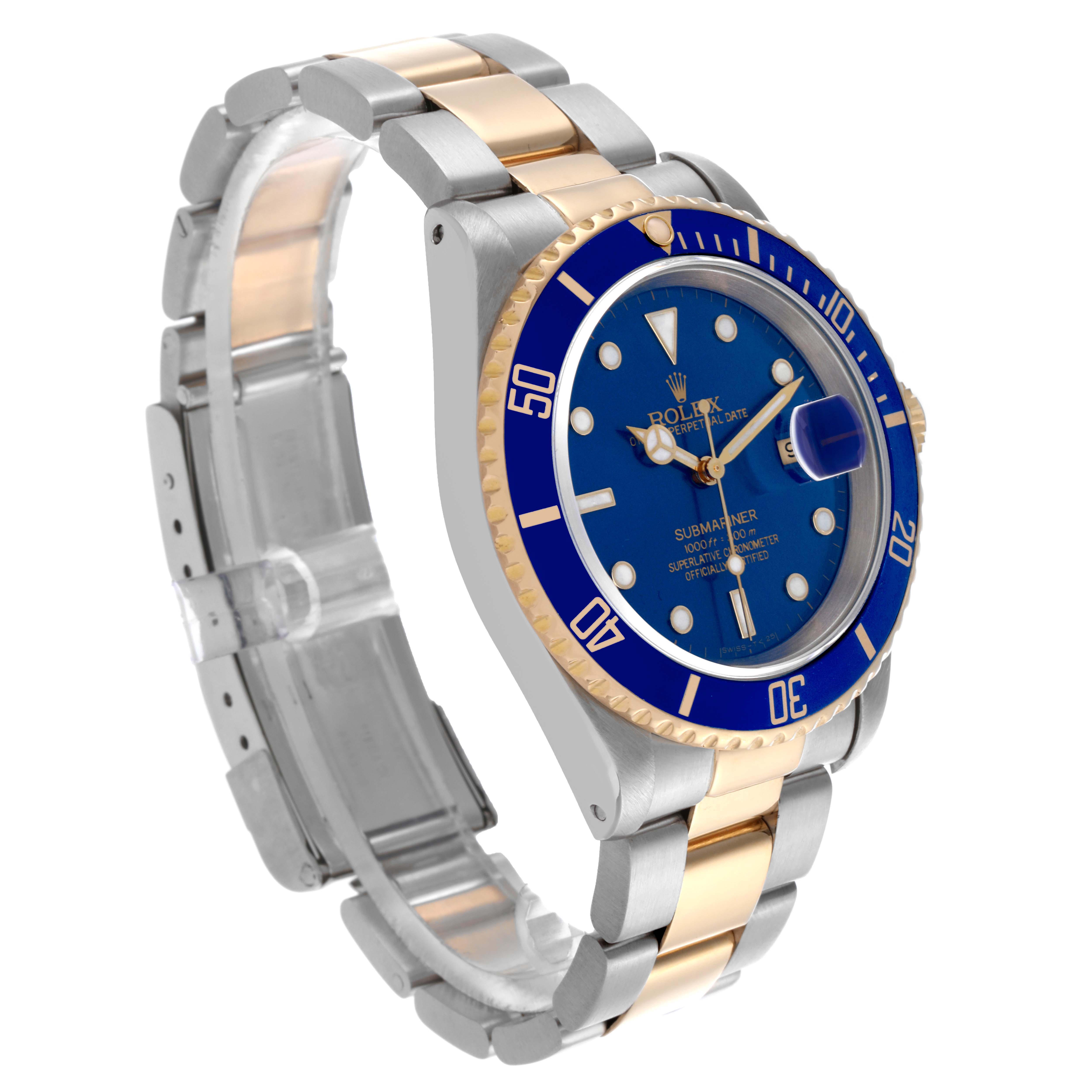 The Rolex Submariner 16613 Men's Steel and Gold (two tone) Blue Dial 16613 Men's Steel and Gold (two tone) Blue Dial watch is shown at a slight angle, featuring its blue dial, bezel, and bicolor metal bracelet.