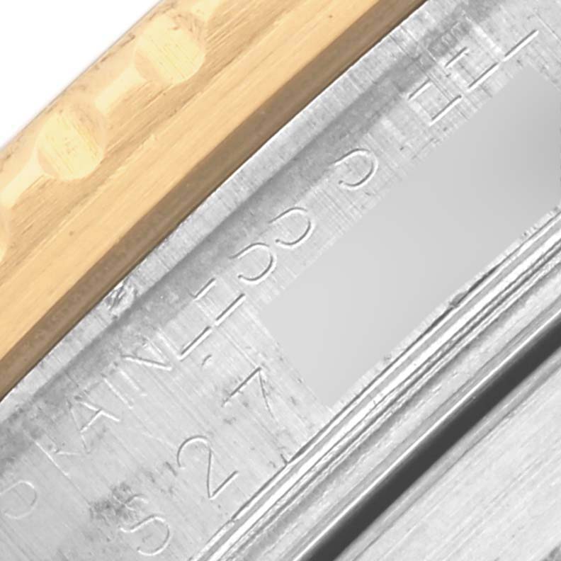 The image shows a close-up of the bezel and engraved case details of a Rolex Submariner 16613 Men's Steel and Gold (two tone) Blue Dial 16613 Men's Steel and Gold (two tone) Blue Dial watch.