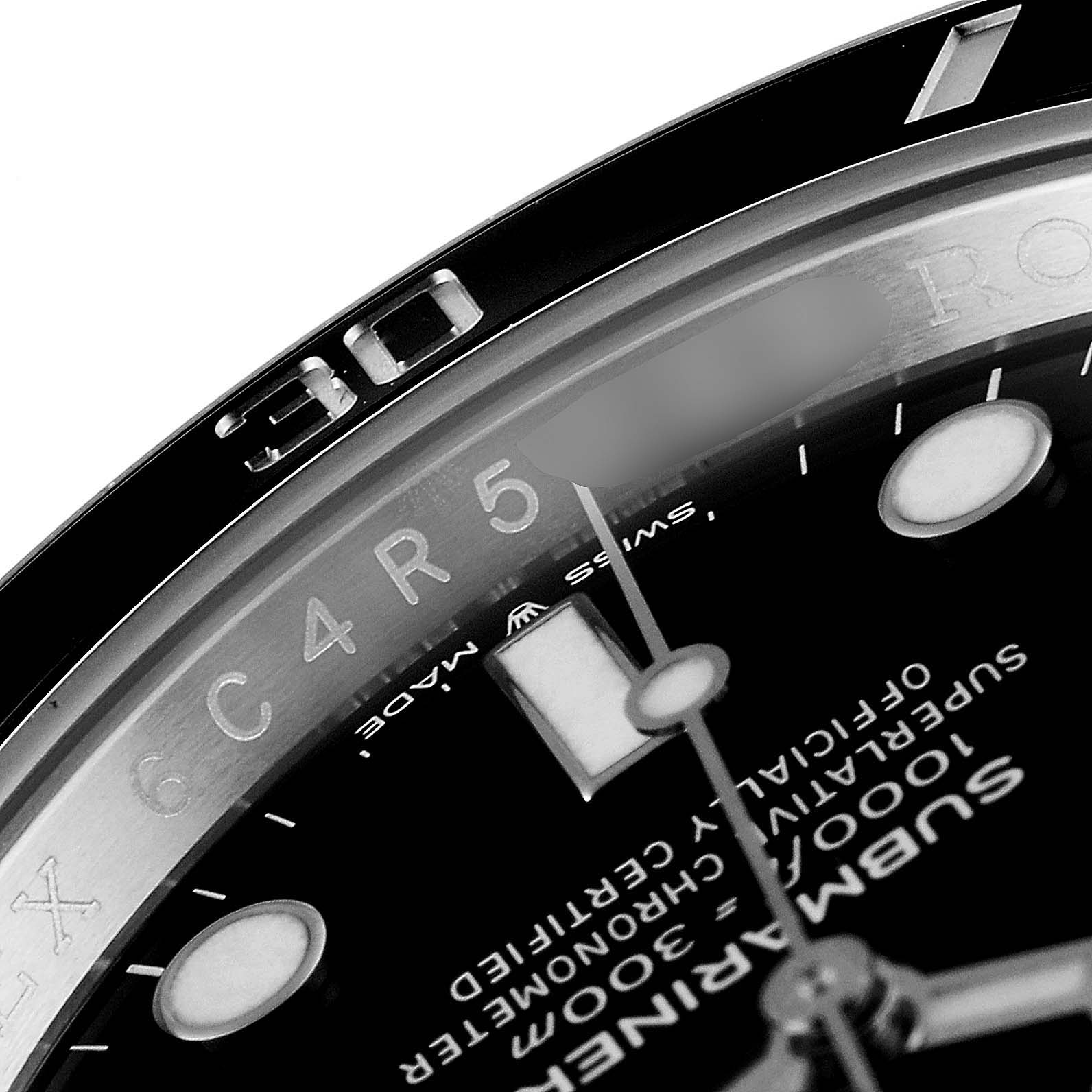 This image showcases a close-up of the dial and bezel from the top left side of a Rolex Submariner 126610LN Men
s Stainless Steel Black Dial 126610LN Men
s Stainless Steel Black Dial watch.