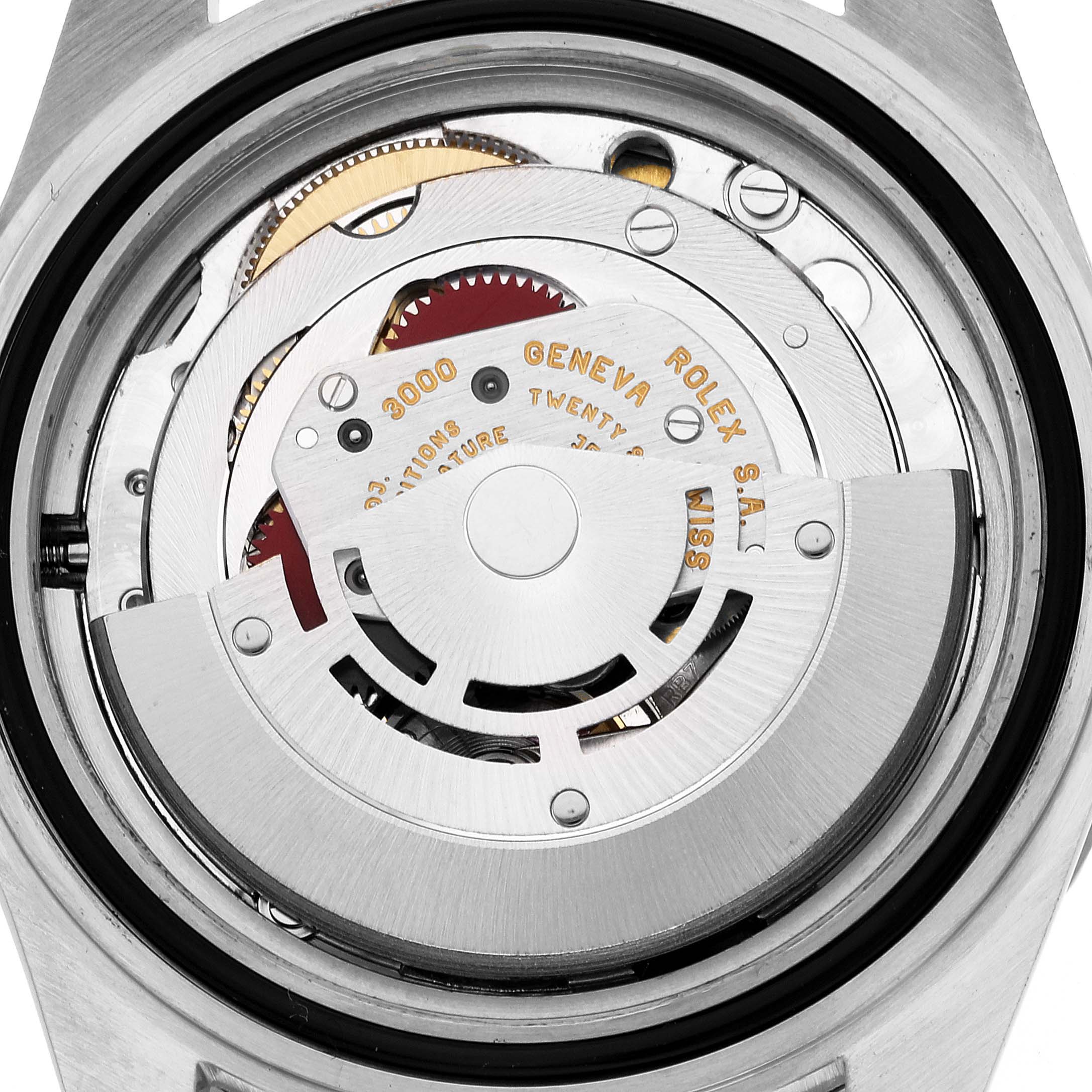 This image shows a Rolex Submariner 14060 Men
s Stainless Steel Black Dial 14060 Men
s Stainless Steel Black Dial watch from the back, highlighting its internal mechanism and parts.