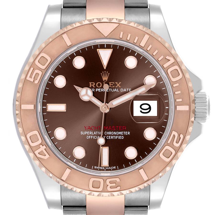 The Rolex Yacht-Master watch is shown from the front, highlighting its bezel, dial, hands, and date display.