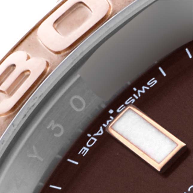 The image shows a close-up angle of the Rolex Yacht-Master 116621 Men's Steel and Gold (two tone) Brown Dial 116621 Men's Steel and Gold (two tone) Brown Dial's bezel and dial, highlighting the "30" marker and part of the "Swiss Made" text.