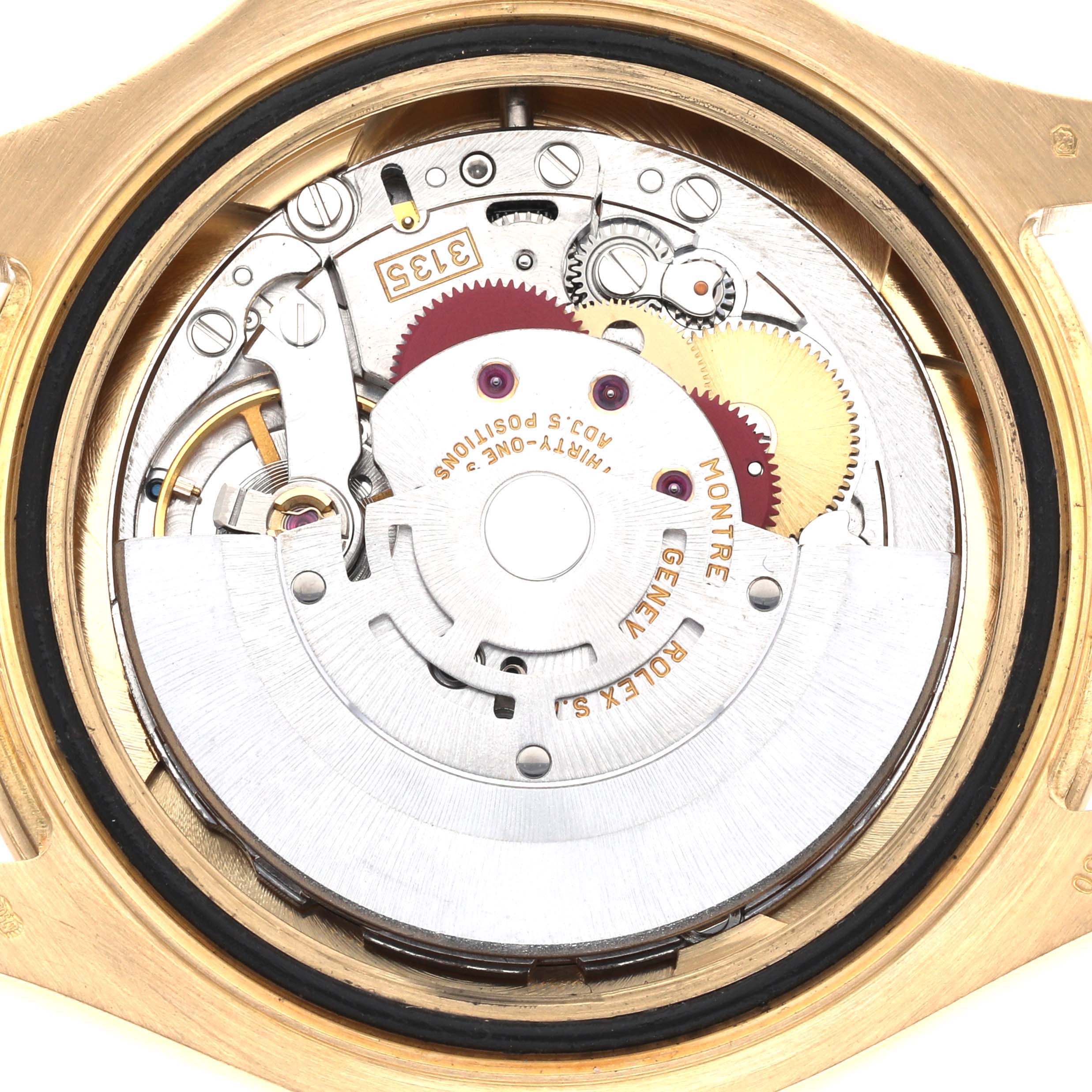 This is a close-up view of the movement inside a Rolex Yacht-Master 16628 Men's Yellow Gold Mother of Pearl Dial 16628 Men's Yellow Gold Mother of Pearl Dial watch, showing gears and intricate components.