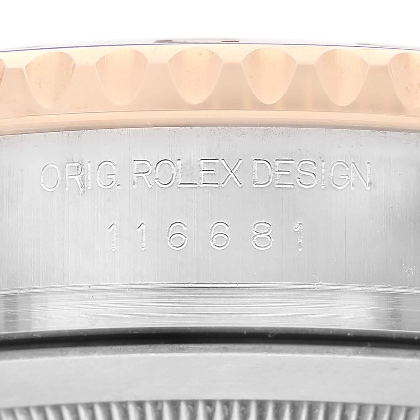 The image shows the side of a Rolex Yacht-Master 116681M Men's Steel and Gold (two tone) White Dial, highlighting the "ORIG. ROLEX DESIGN" engraving and model number.