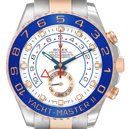 The image shows a front view of the Rolex Yacht-Master 116681M Men's Steel and Gold (two tone) White Dial II watch, highlighting the blue and gold bezel, dial, and crown.