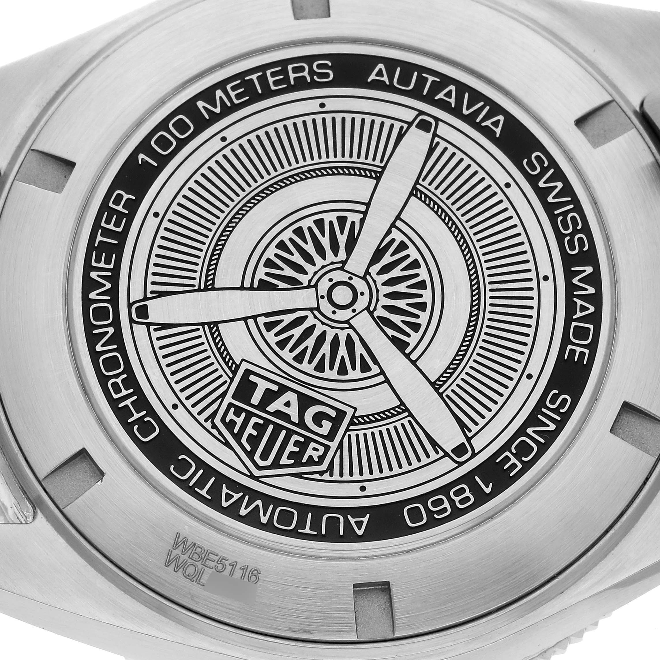 This is the case back of a Tag Heuer Autavia WBE5116.EB0173 Men's Stainless Steel Blue Dial WBE5116.EB0173 Men's Stainless Steel Blue Dial watch, displaying the brand's logo and various specifications.