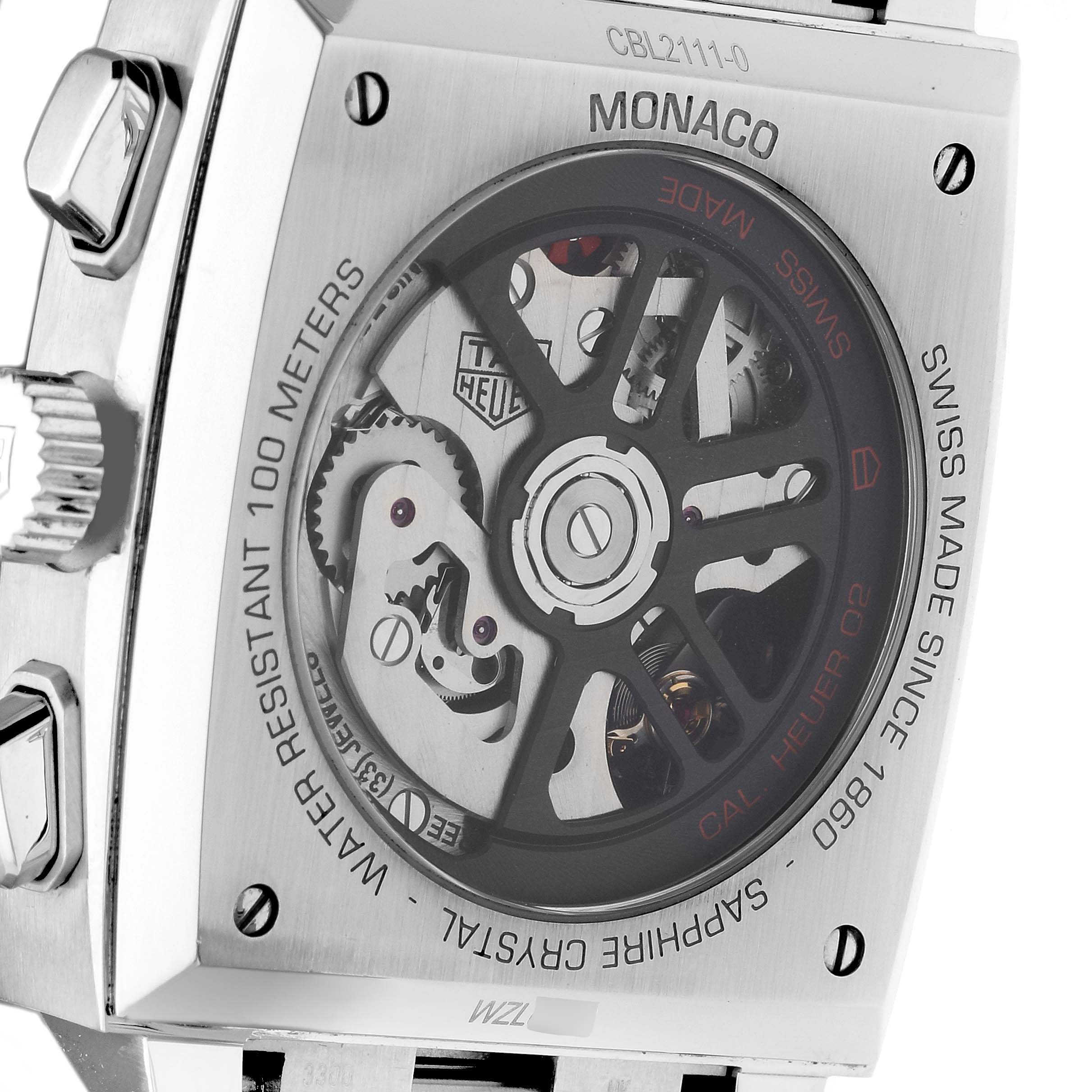 The image shows the backside of a Tag Heuer Monaco CBL2111.BA0644 Men's Stainless Steel Blue Dial CBL2111.BA0644 Men's Stainless Steel Blue Dial watch, revealing the movement mechanism and engraving details.