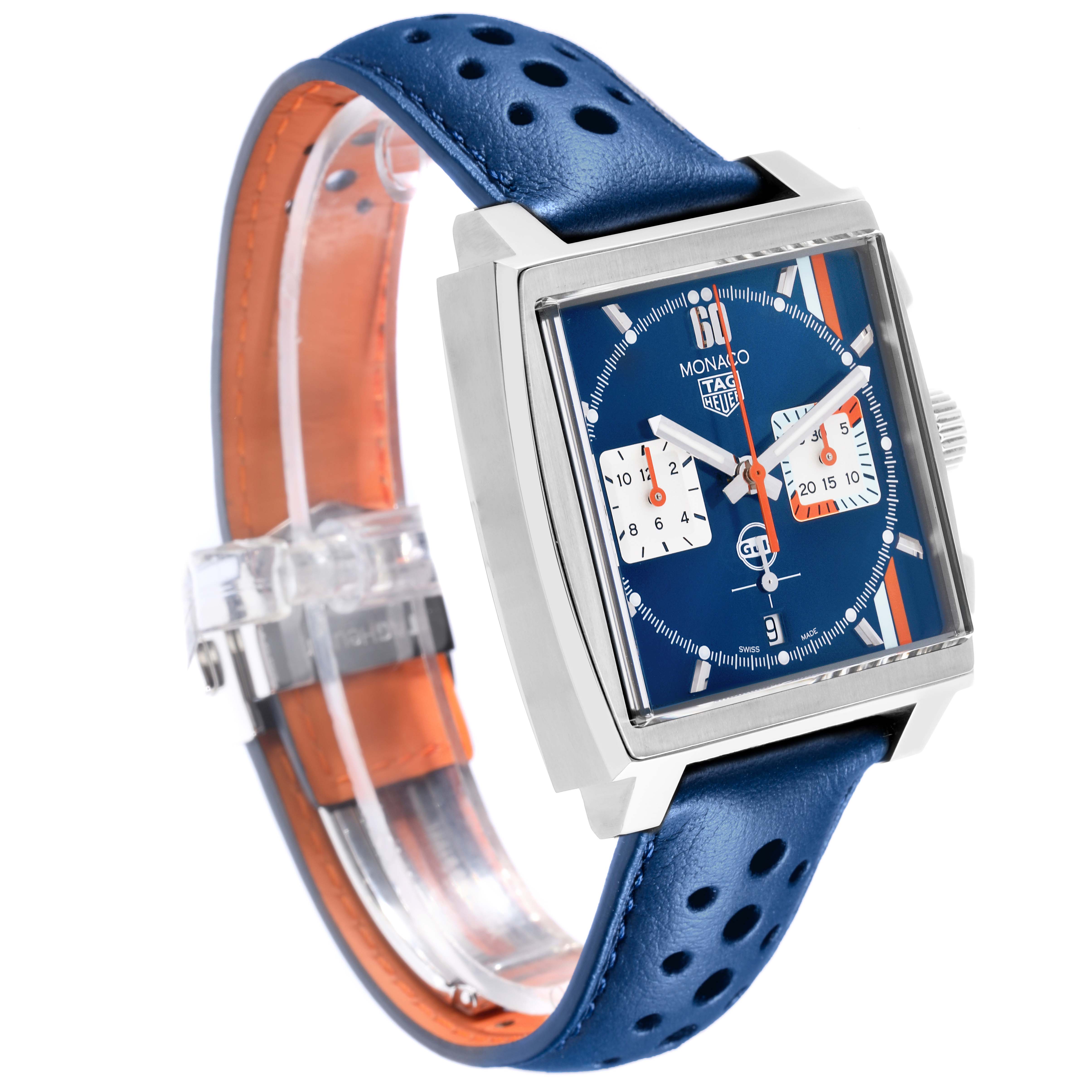 The Tag Heuer Monaco CBL2115.FC6494 Men's Stainless Steel Blue Dial CBL2115.FC6494 Men's Stainless Steel Blue Dial watch is shown at an angled view, highlighting its square face, blue dial, and perforated blue strap.