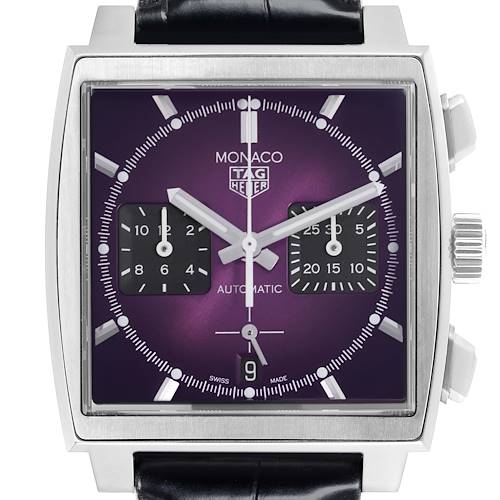 The Tag Heuer Monaco watch is shown from a front angle, displaying its square face, purple dial, and chronograph subdials.