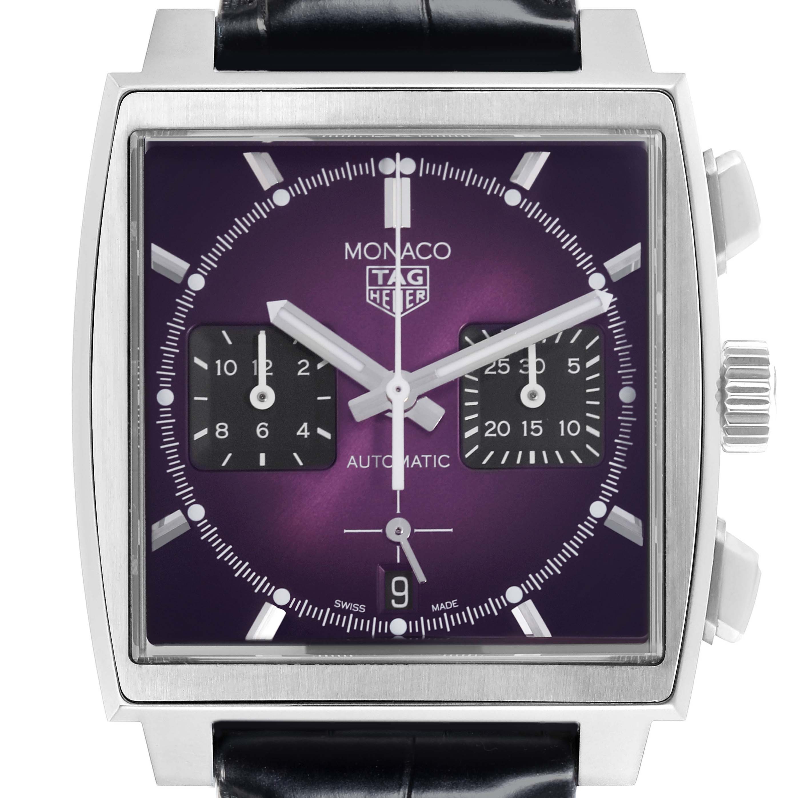 The Tag Heuer Monaco CBL2118.FC6518 Men's Stainless Steel Purple Dial CBL2118.FC6518 Men's Stainless Steel Purple Dial watch is shown from the front, displaying its face, dial, hands, and part of the strap.