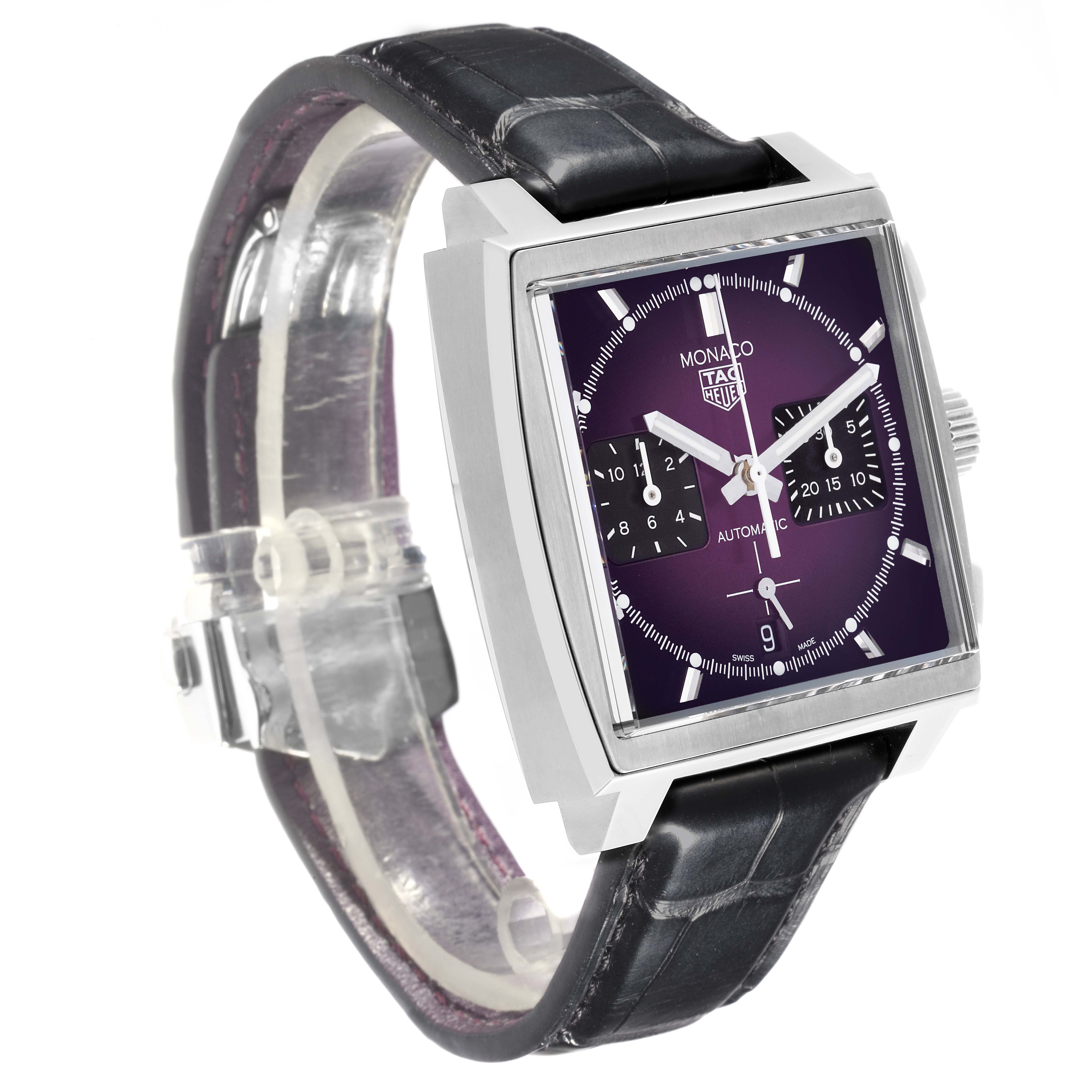 The Tag Heuer Monaco CBL2118.FC6518 Men's Stainless Steel Purple Dial CBL2118.FC6518 Men's Stainless Steel Purple Dial watch is shown at a 3/4 angle, displaying its purple dial, square case, and black strap.