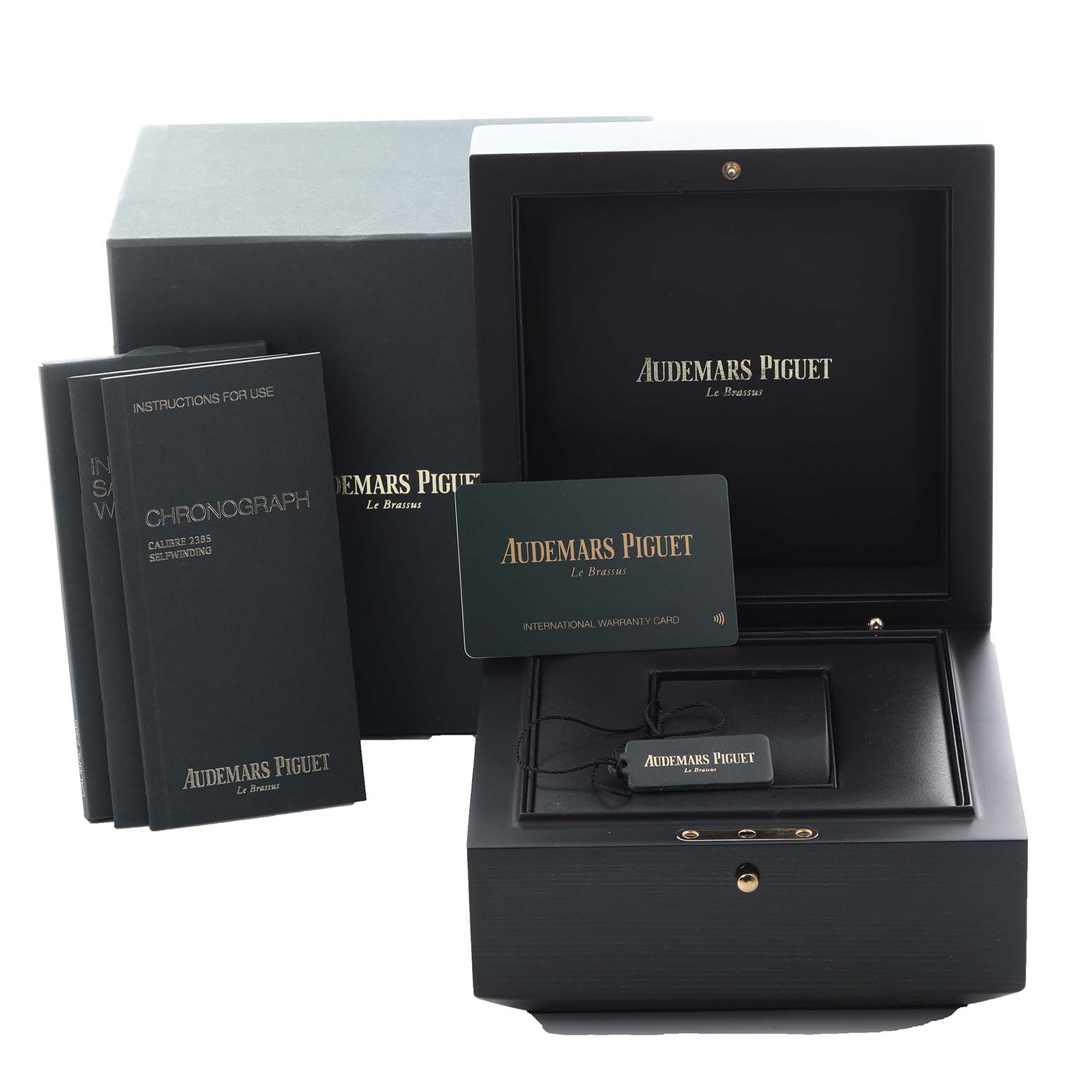 The image shows the open box, warranty card, and instruction booklets for an Audemars Piguet Royal Oak 26331OR.OO.D315CR.01 Men's Rose Gold Blue Dial 26331OR.OO.D315CR.01 Men's Rose Gold Blue Dial watch.