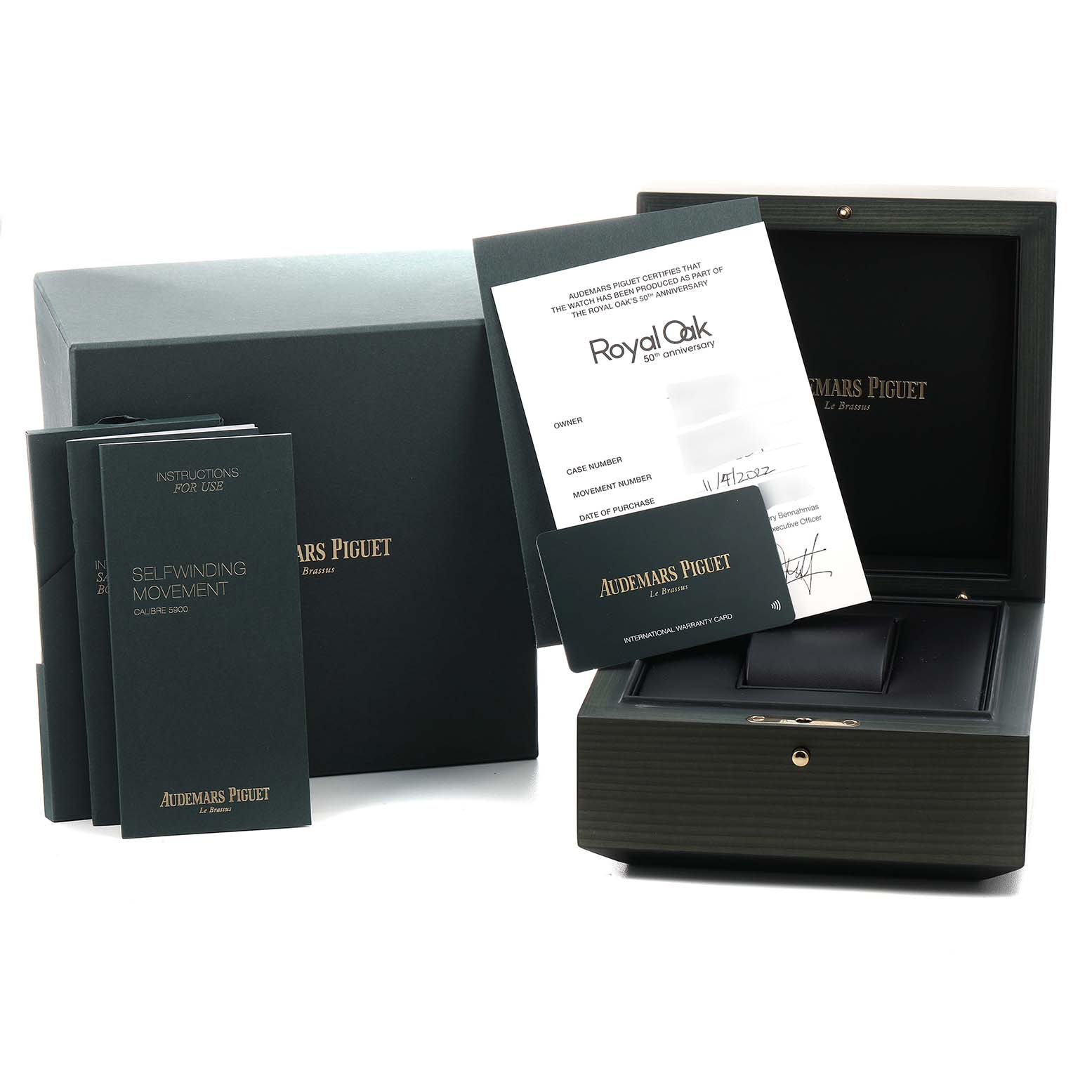 The image shows the Audemars Piguet Royal Oak 15550ST.00.1356ST.06 Men's Stainless Steel Blue Dial packaging, paperwork, and box, but the watch itself is not visible.