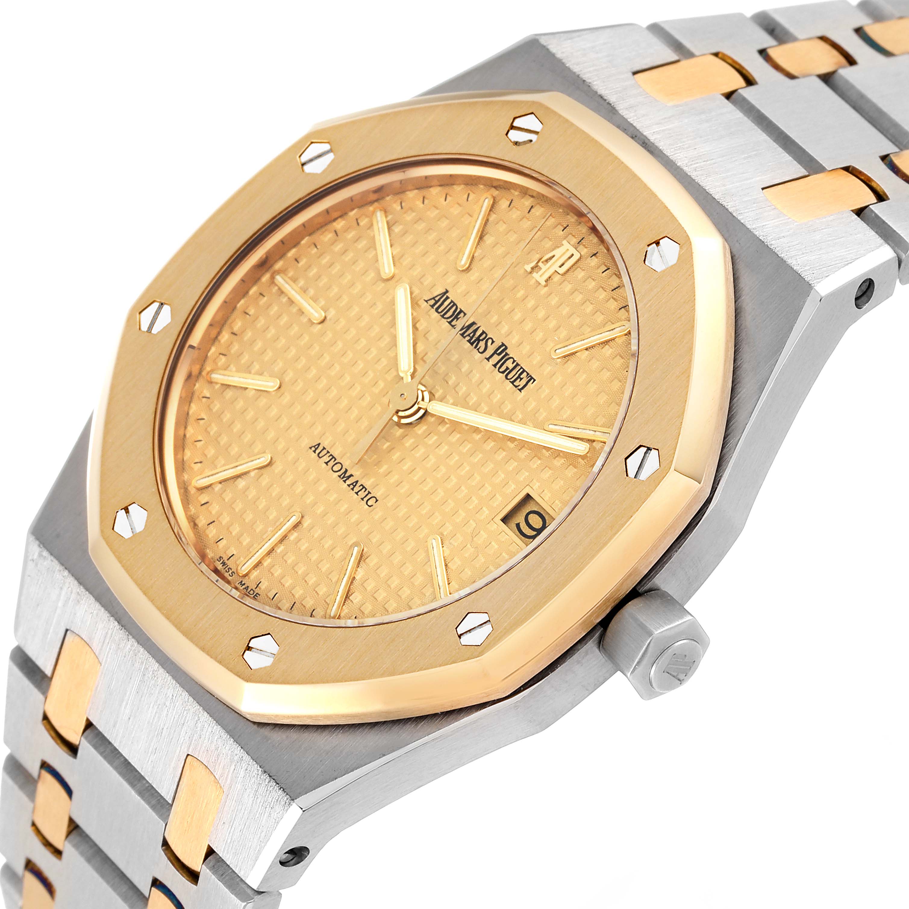 This image shows a close-up of the dial, bezel, crown, and a portion of the bracelet of an Audemars Piguet Royal Oak 14790SA Men's Steel and Gold (two tone) Champagne Dial 14790SA Men's Steel and Gold (two tone) Champagne Dial watch.