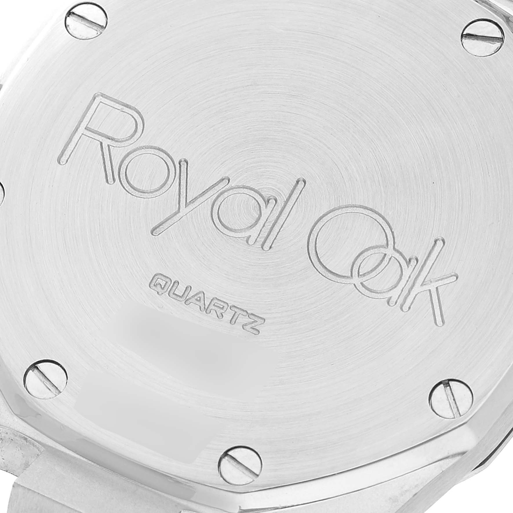 This image shows the stainless steel case back of an Audemars Piguet Royal Oak 56303SA Men's Steel and Gold (two tone) Grey Dial 56303SA Men's Steel and Gold (two tone) Grey Dial Quartz watch.