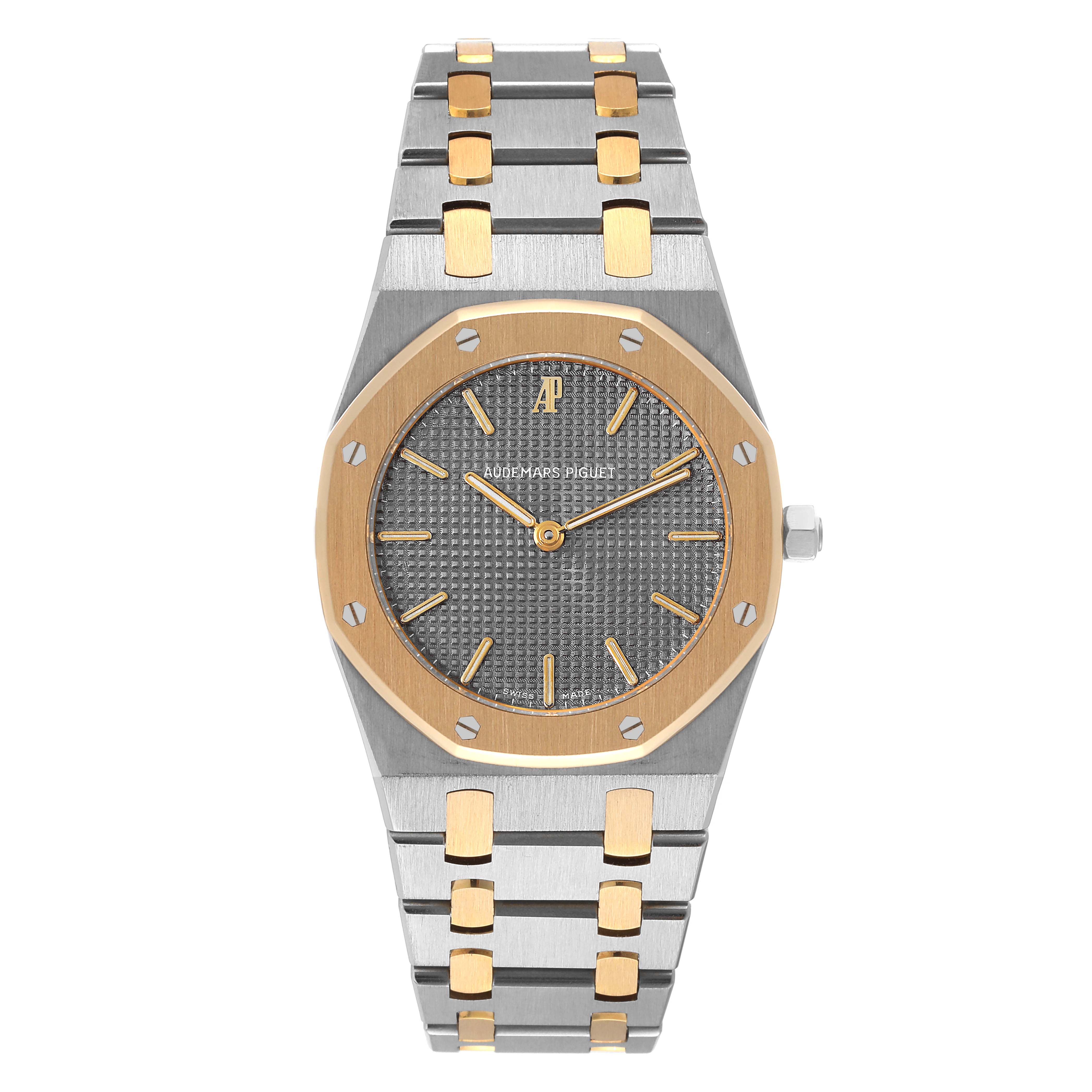 The image shows a front view of an Audemars Piguet Royal Oak 56303SA Men's Steel and Gold (two tone) Grey Dial 56303SA Men's Steel and Gold (two tone) Grey Dial watch, displaying its dual-tone bracelet, octagonal bezel, and dial.