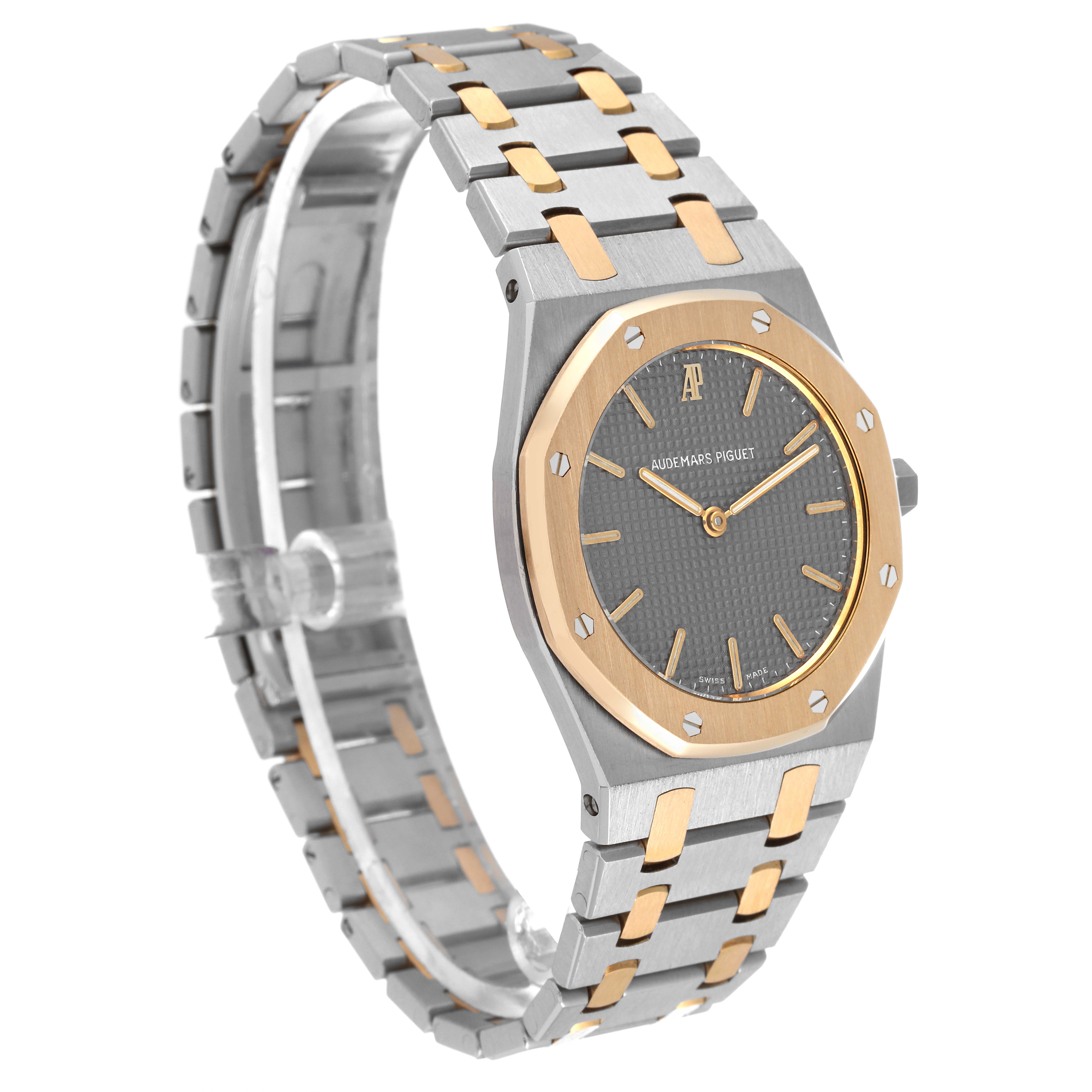 The image shows a side-front angle of the Audemars Piguet Royal Oak 56303SA Men's Steel and Gold (two tone) Grey Dial 56303SA Men's Steel and Gold (two tone) Grey Dial watch, highlighting its bracelet and case.