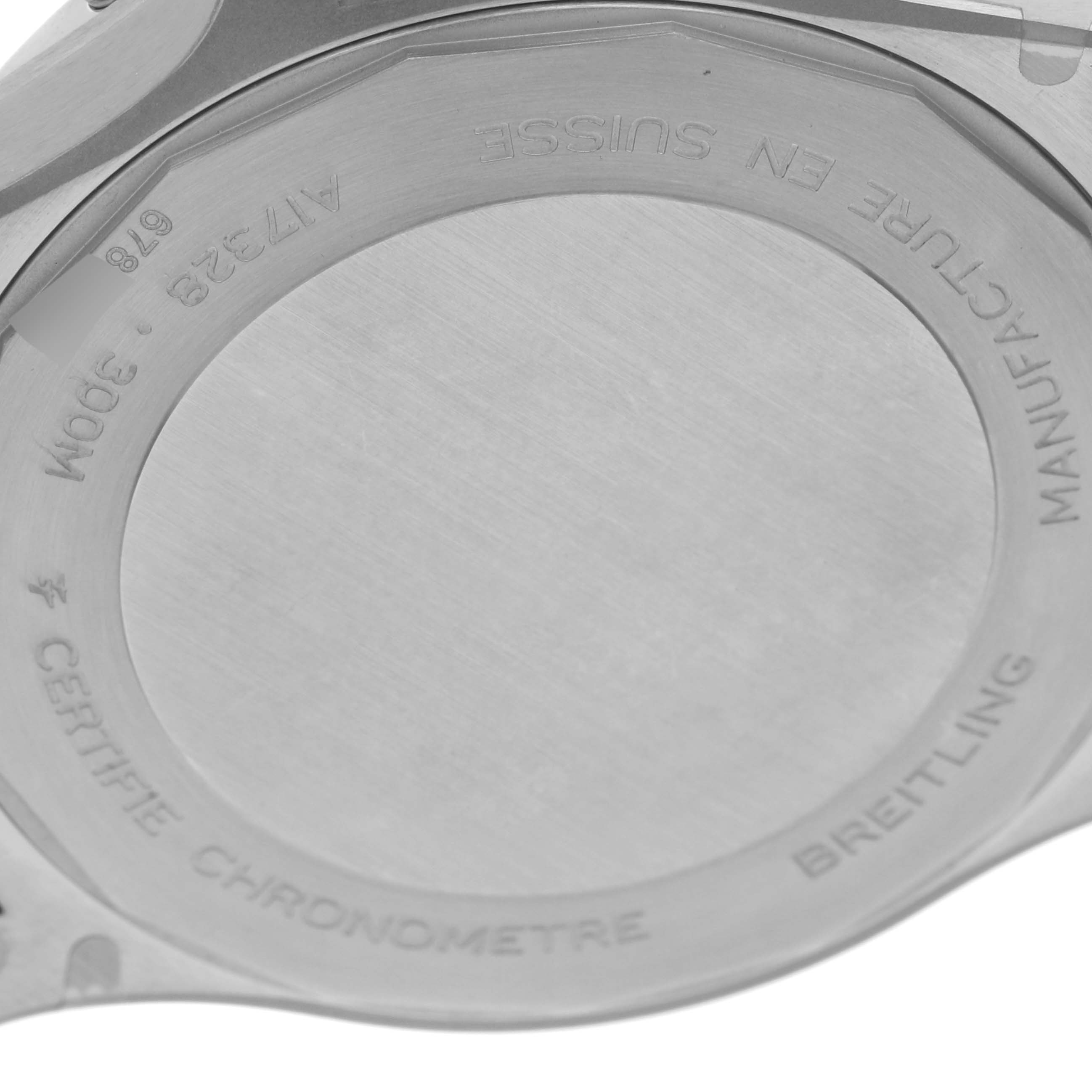 The image shows the back case of a Breitling Avenger A17328 Men's Stainless Steel Green Dial A17328 Men's Stainless Steel Green Dial watch, displaying engravings and text.