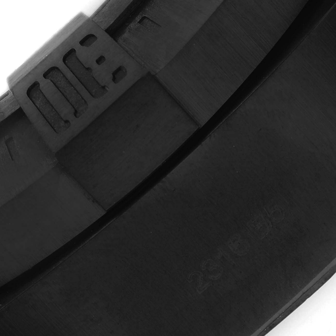 The image shows a close-up of the black rubber strap of the Breitling Avenger M17331 Men's Stainless Steel Yellow Dial watch, focusing on the internal texture and markings.