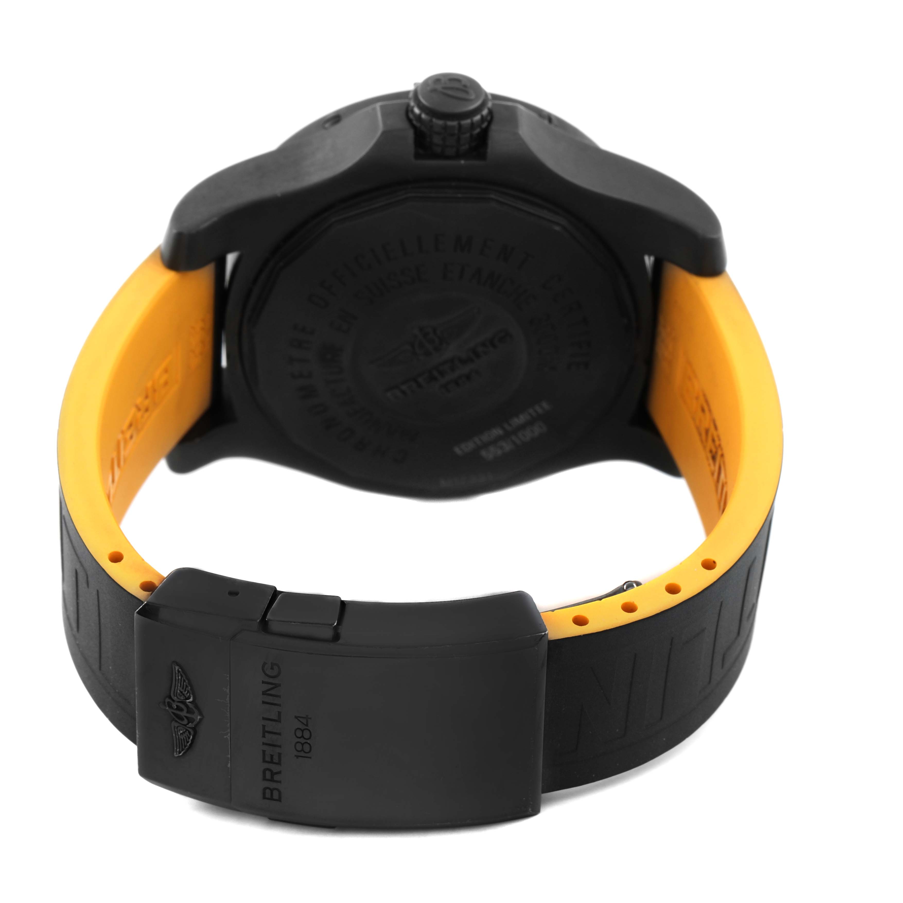 The image shows the back view of a Breitling Avenger M17331 Men's Stainless Steel Yellow Dial watch, highlighting its black case, yellow inner strap, and clasp.