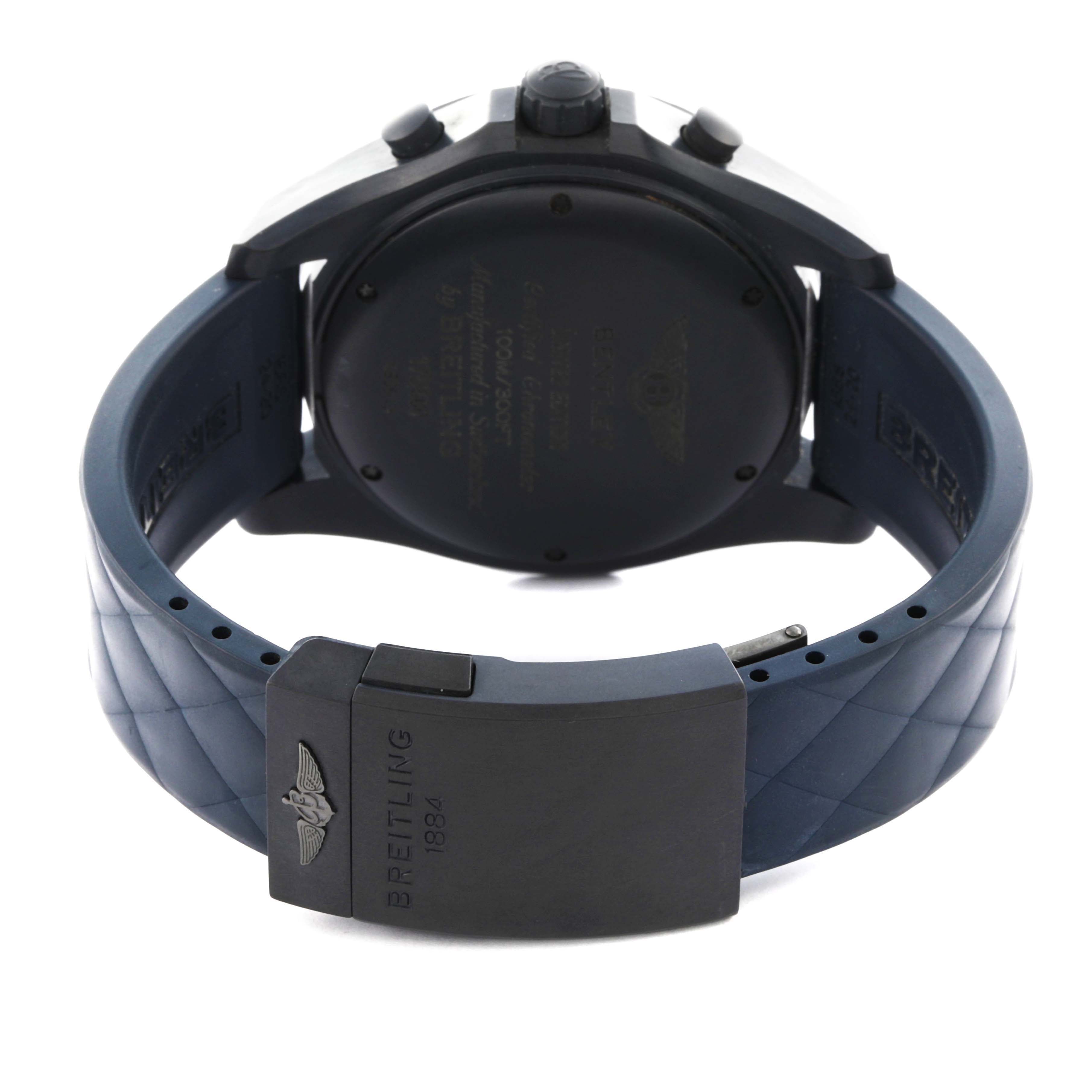 The image shows the back and clasp of the Bentley model watch by Breitling, featuring a rubber strap and engraved clasp.